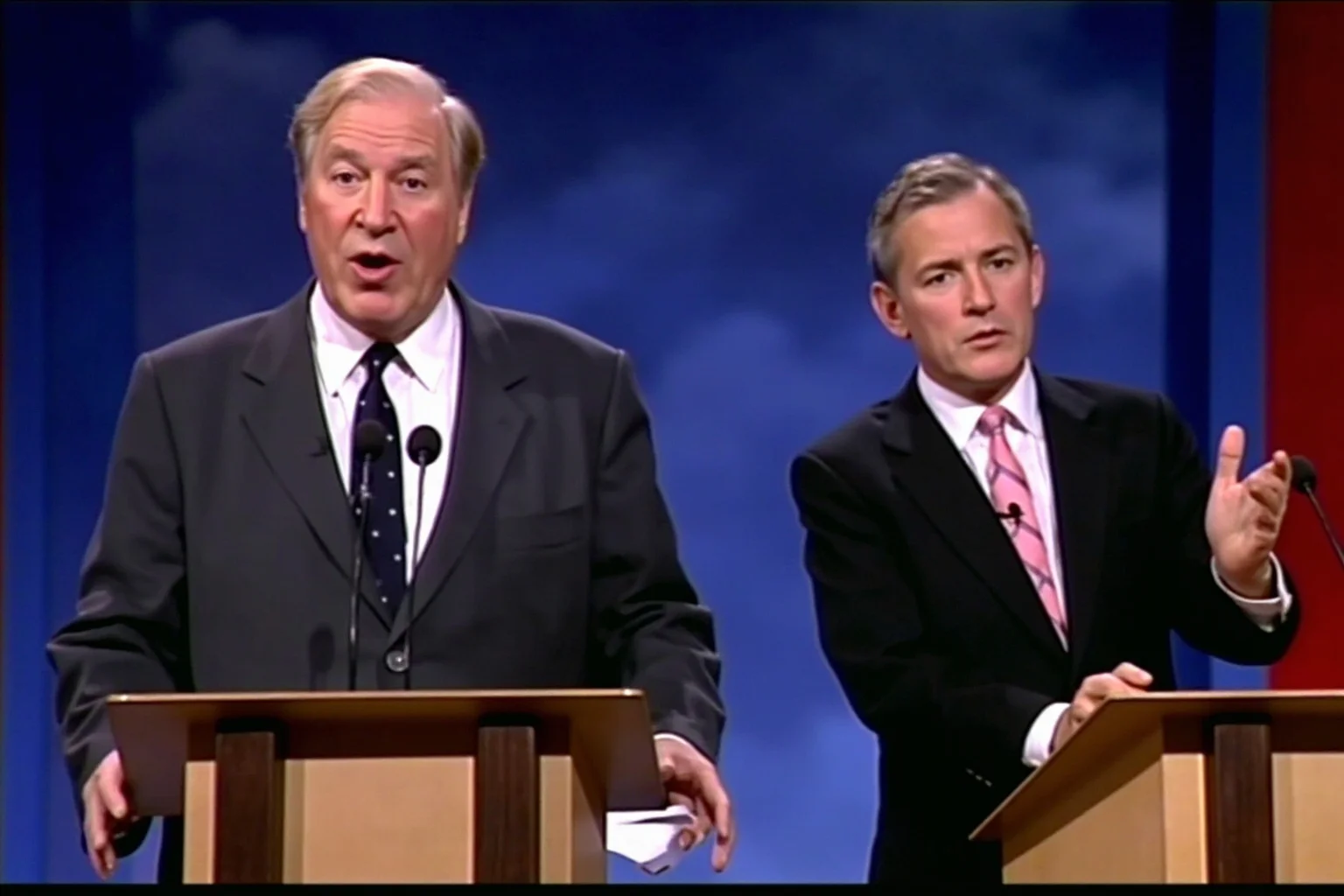 Best Insults in History: 23 Legendary Put-Downs and the Stories Behind Them 23 1980s television debate stage with two suited figures at podiums, one gesturing firmly mid-sentence