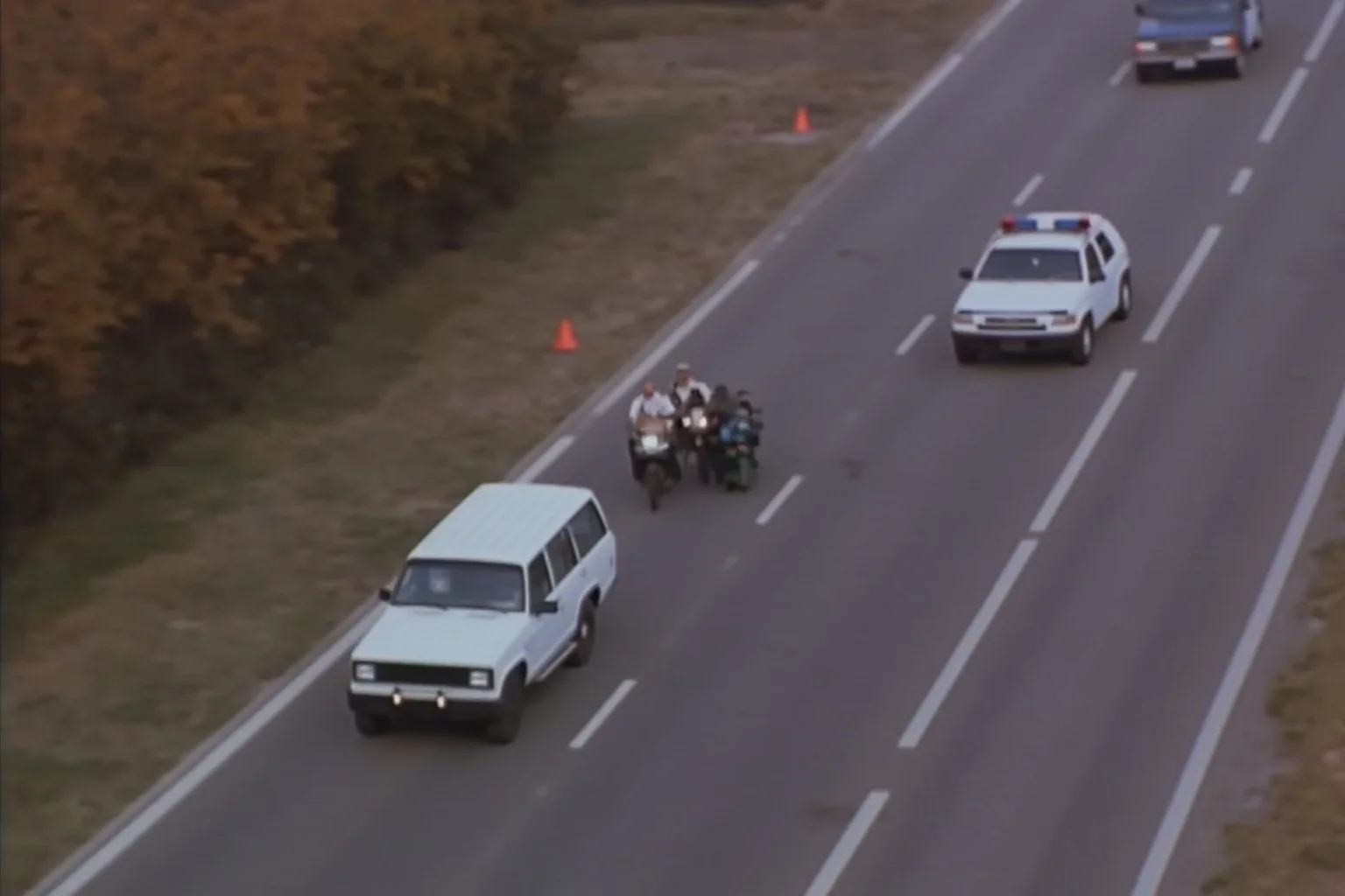Most Important Historical Events Televised Live 17 A 1990s television showing an aerial highway view with a single white SUV trailed by several police cars