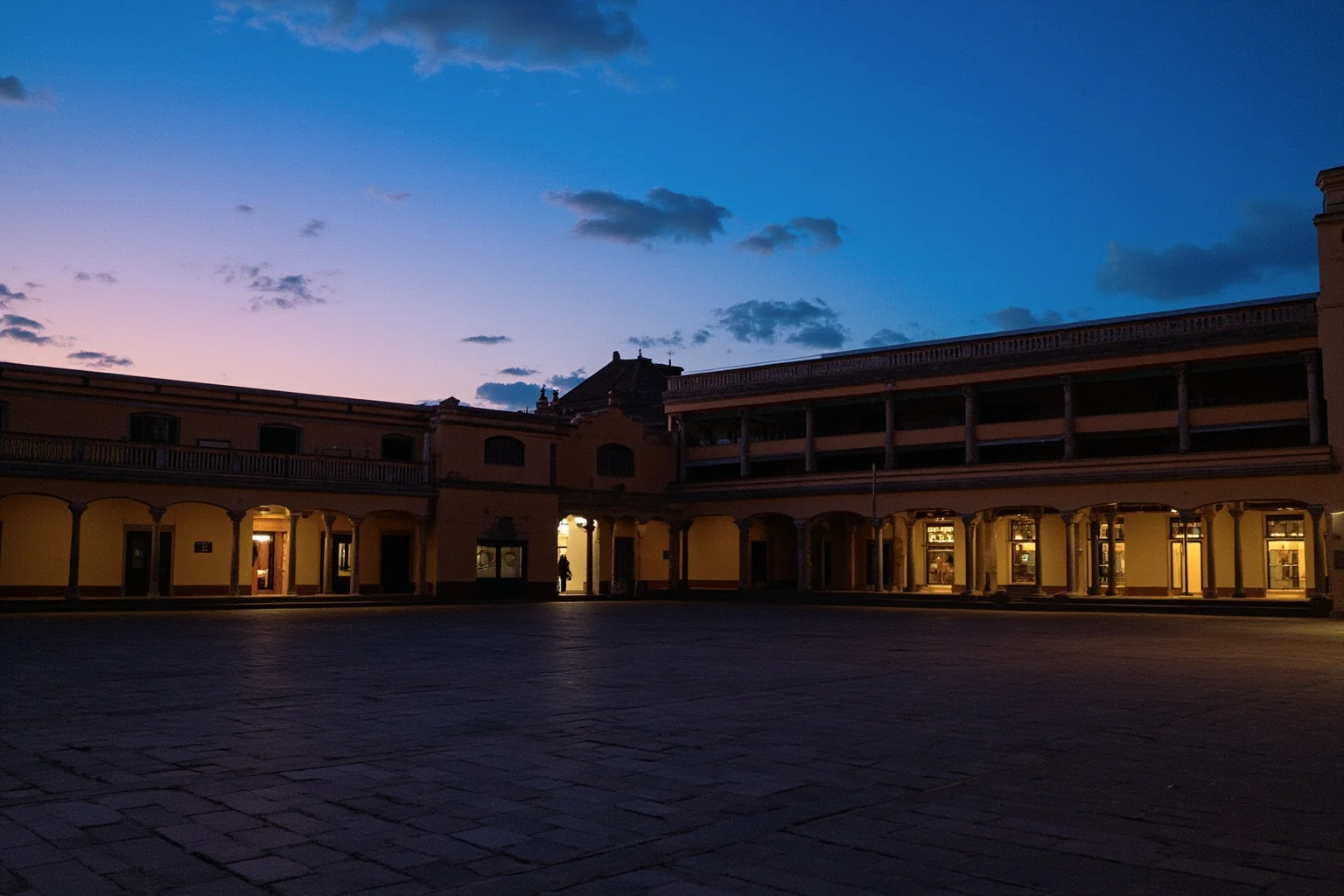 TB or Not TB: 22 Historical Figures Who Contracted Tuberculosis 19 A 19th-century South American plaza with colonial architecture at dusk