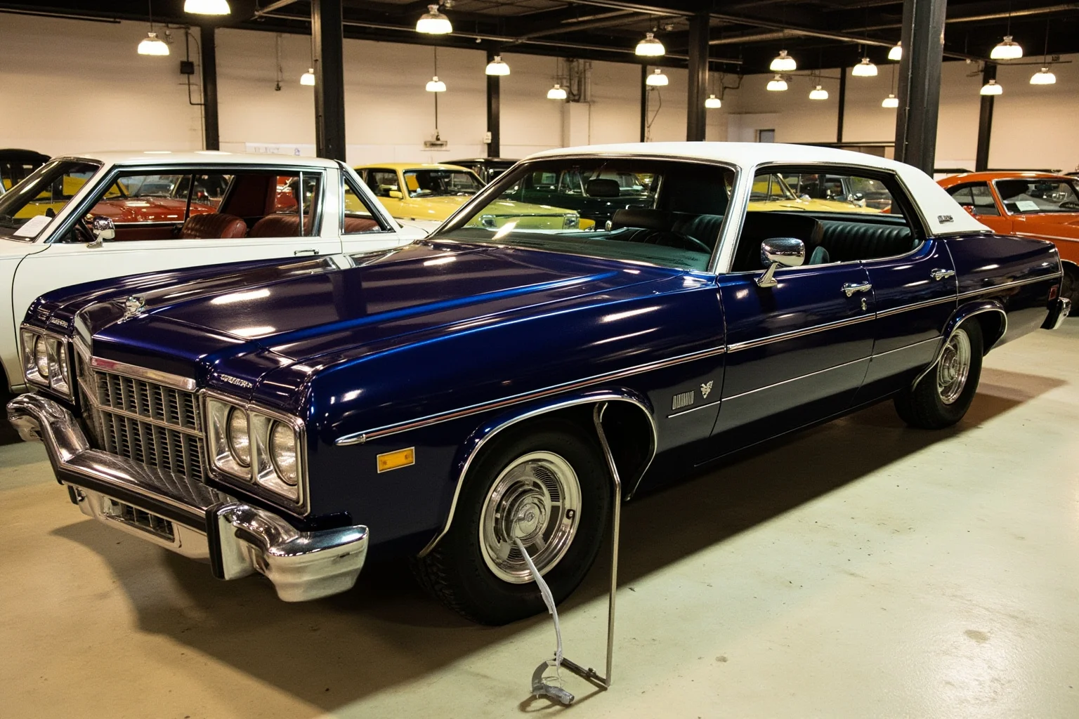 A classic 1970s American sedan displayed in a vintage car dealership showroom