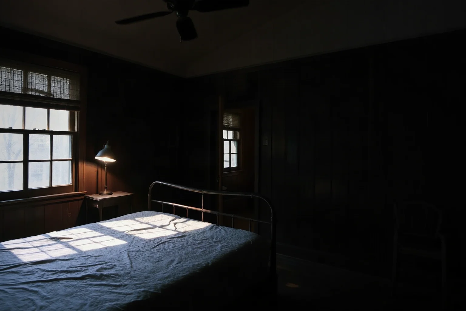 A dark wood-paneled 1940s bedroom with a single dim lamp casting long shadows