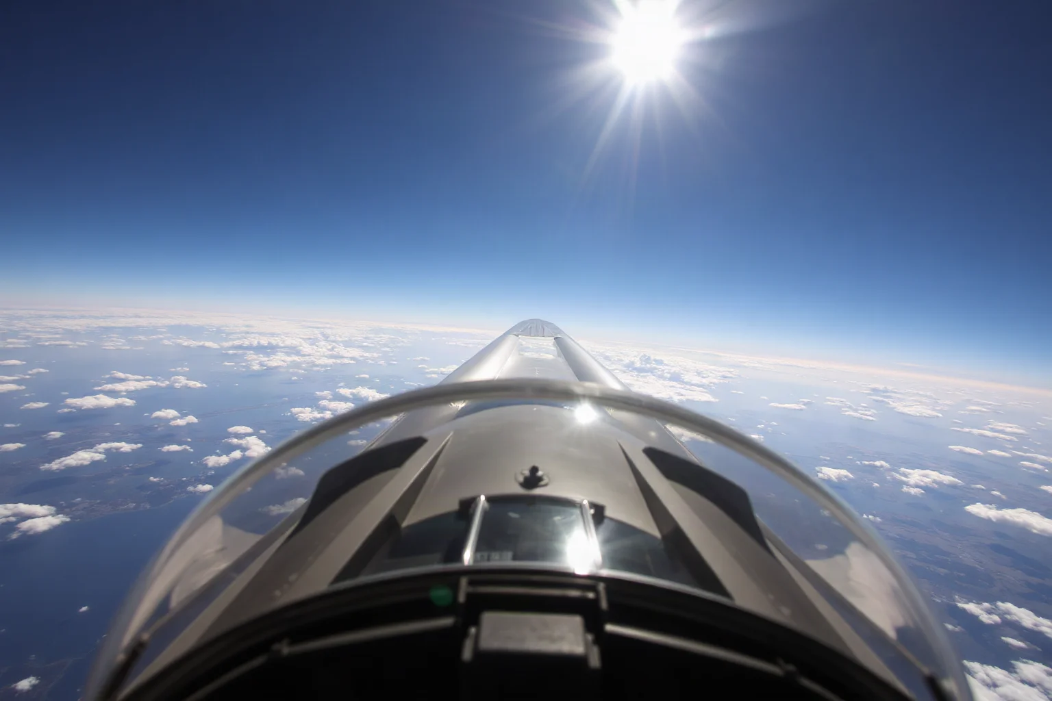 A fighter pilot's view from a jet cockpit looking across at a nearby airliner's windows