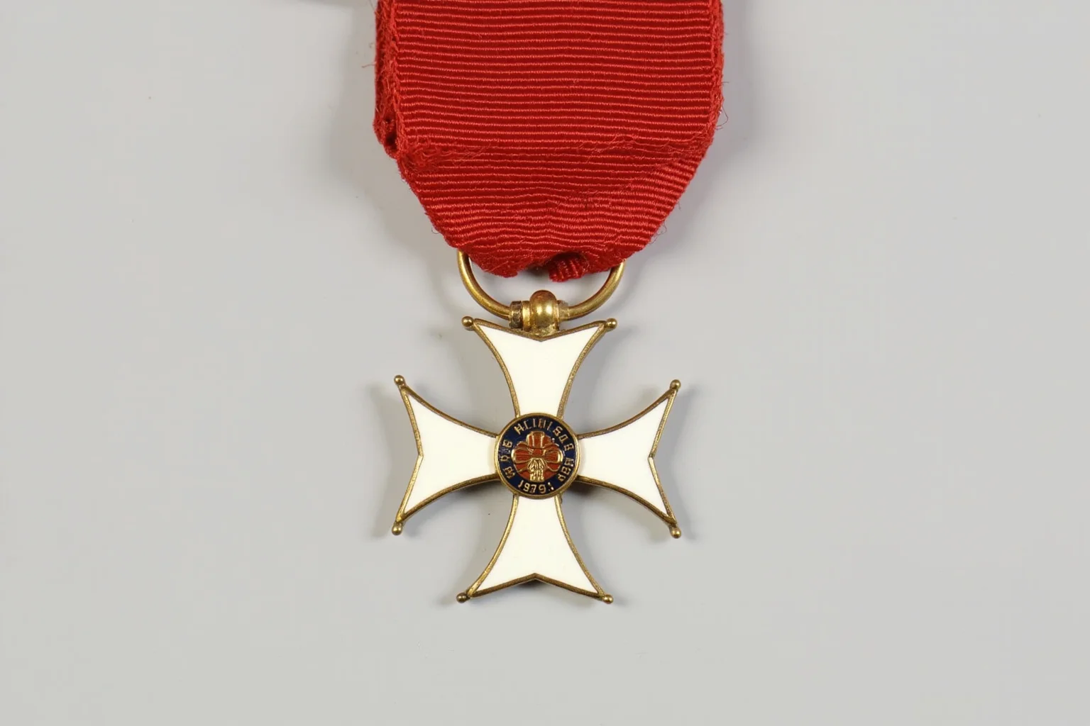 Highest Military Decorations: 20 Rare and Obsolete Medals You'll Never See Again 20 A five-armed white enameled cross medal on a red ribbon, representing a historic national order of honor