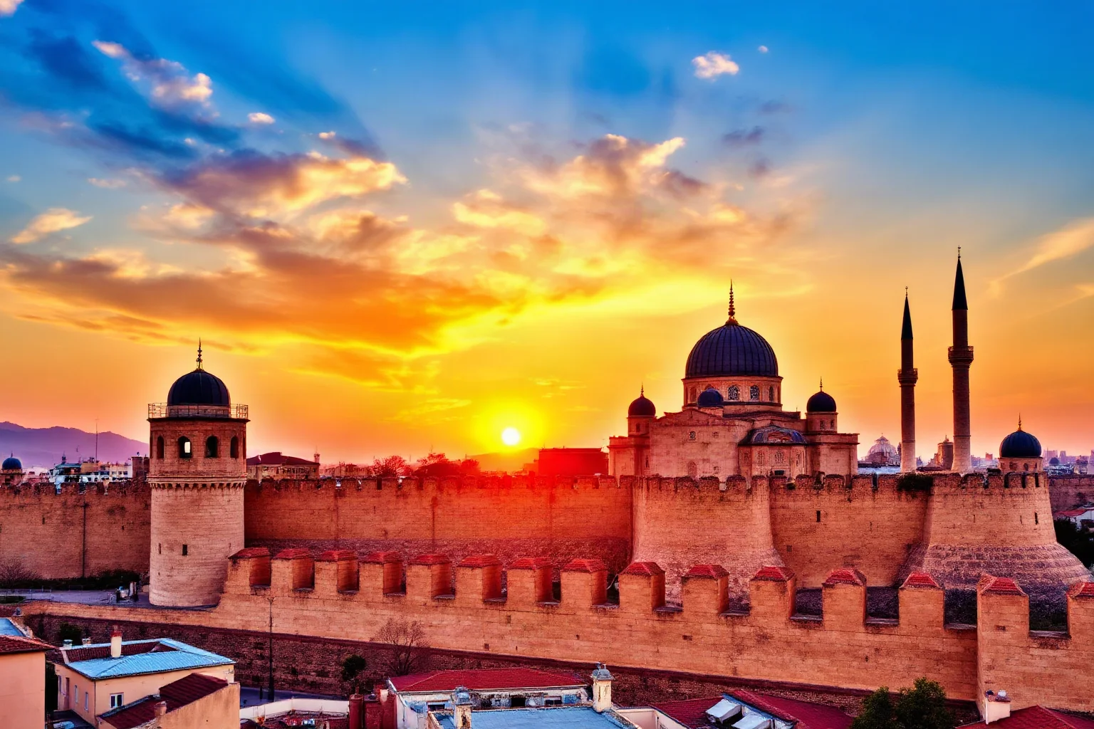 A grand walled city skyline with domes and minarets at sunset, evoking a historic siege