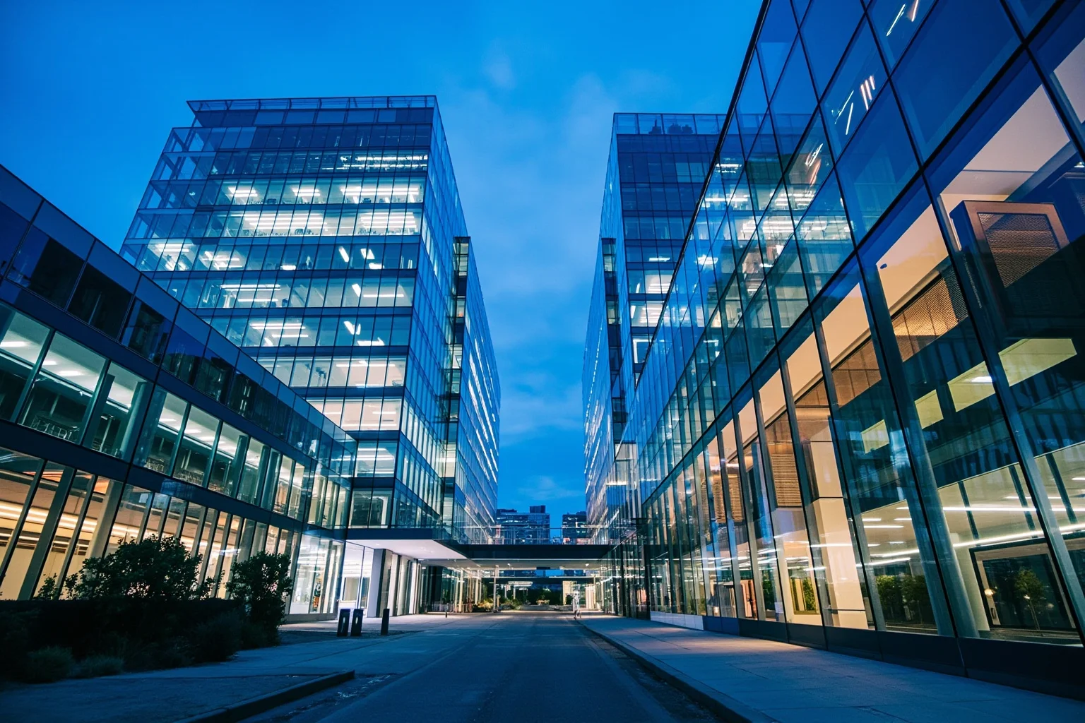 A modern tech campus with glass buildings and servers, representing Google and Silicon Valley tech innovation