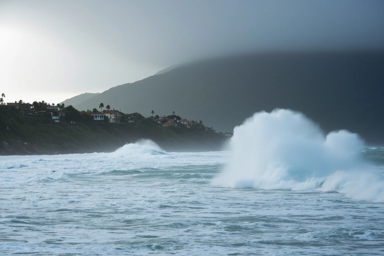 The Worst Events in Human History: 22 of the Darkest Chapters Ever Recorded 19 A powerful ocean wave approaching a coastal village, representing the 2004 Indian Ocean tsunami