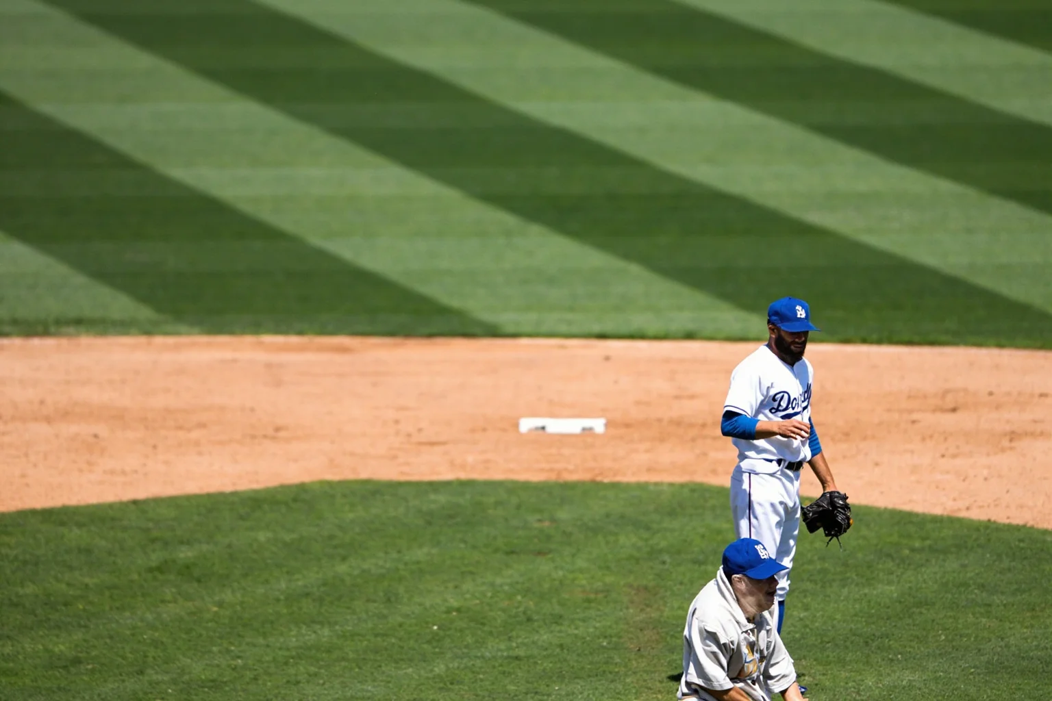 Biggest Brawls In Baseball History 21 A relief pitcher glaring toward home plate after a high fastball as both bullpens sprint onto the outfield grass