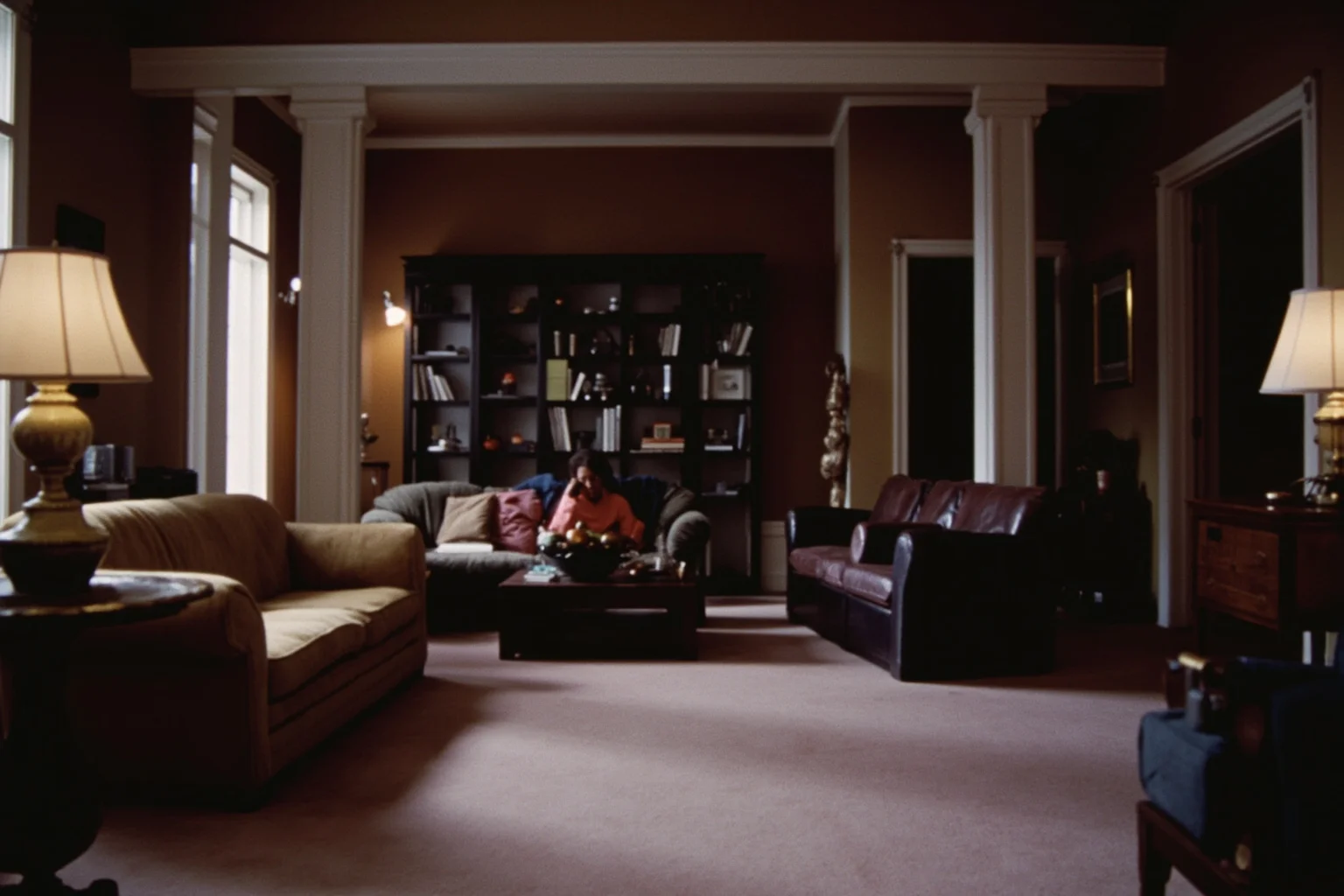 22 Hollywood Stars Whose Lives Ended in Tragedy 19 A retro 1980s sitcom-style living room set, empty and dimly lit, evoking a fallen child star's story