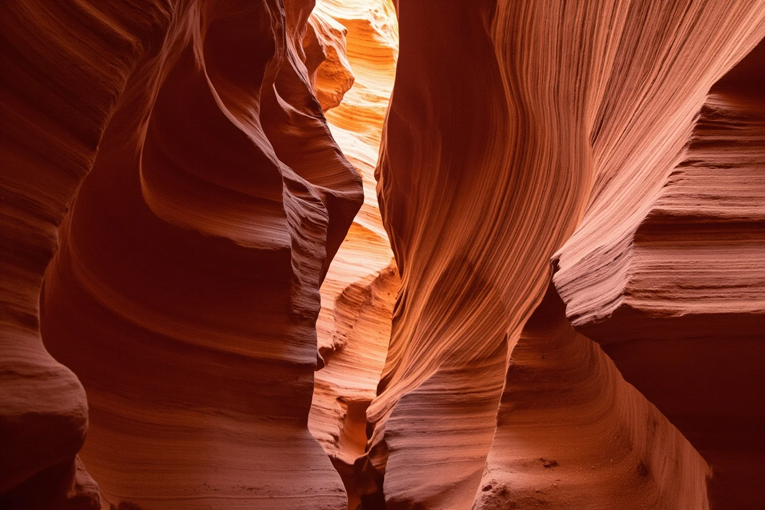 A rugged red-rock desert canyon in Utah with narrow slot canyon walls