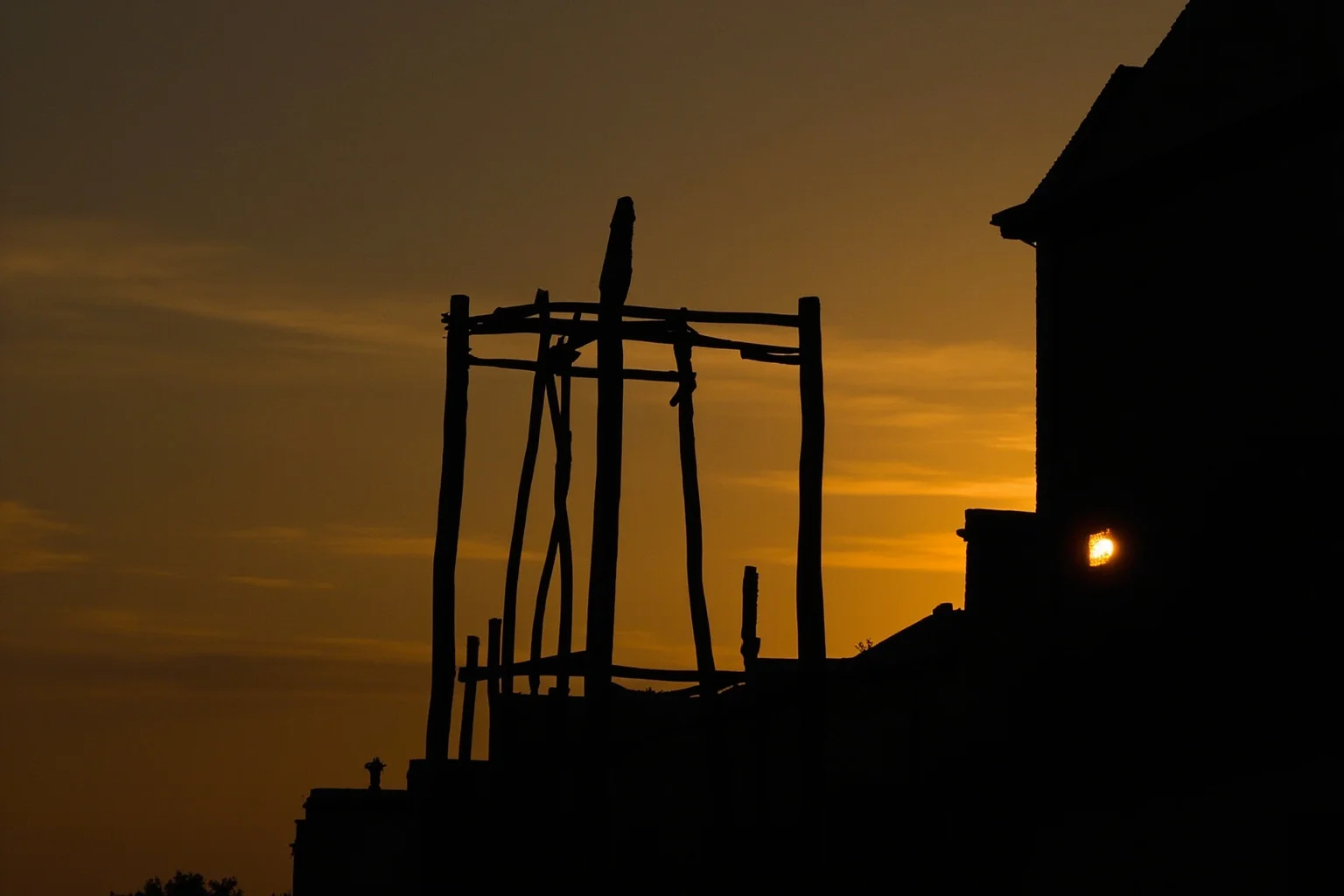 A somber 18th-century Parisian scaffold silhouette at dawn, historical and respectful, no explicit violence shown