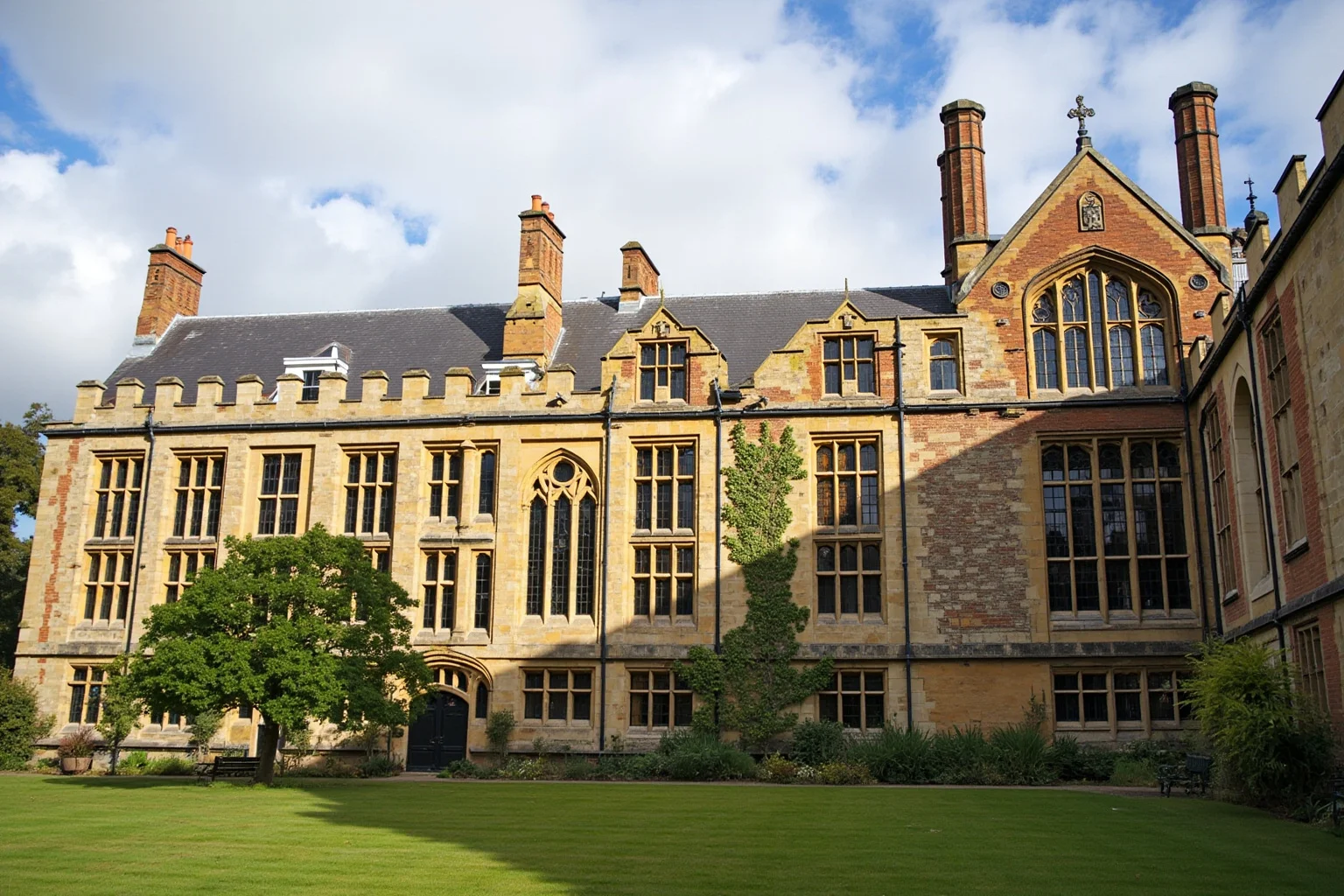 A stately university building with gothic architecture representing a historic British university campus