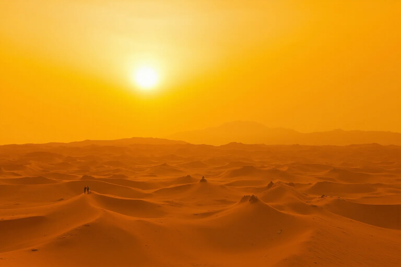 A vast golden desert dune landscape under a scorching sun with a tiny distant wandering figure