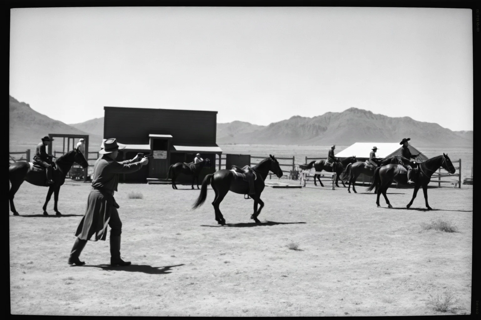 A vintage black-and-white film set recreation of a Western movie shootout scene, clearly staged
