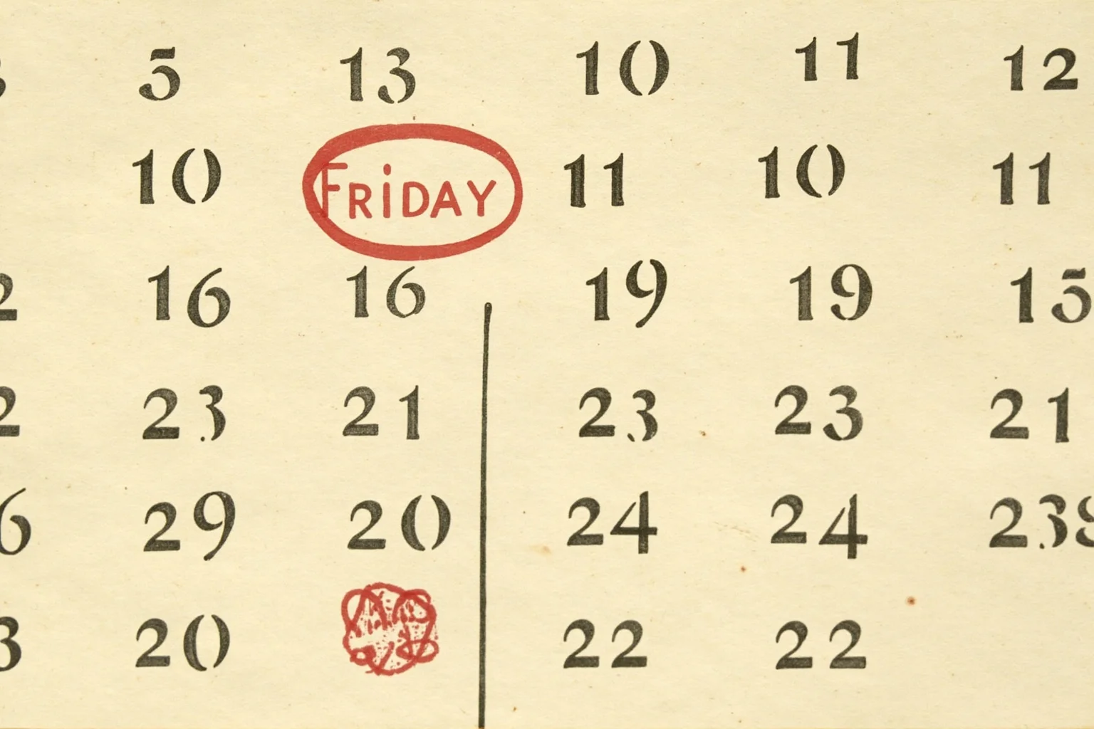 A vintage calendar page showing Friday the 13th circled in red ink
