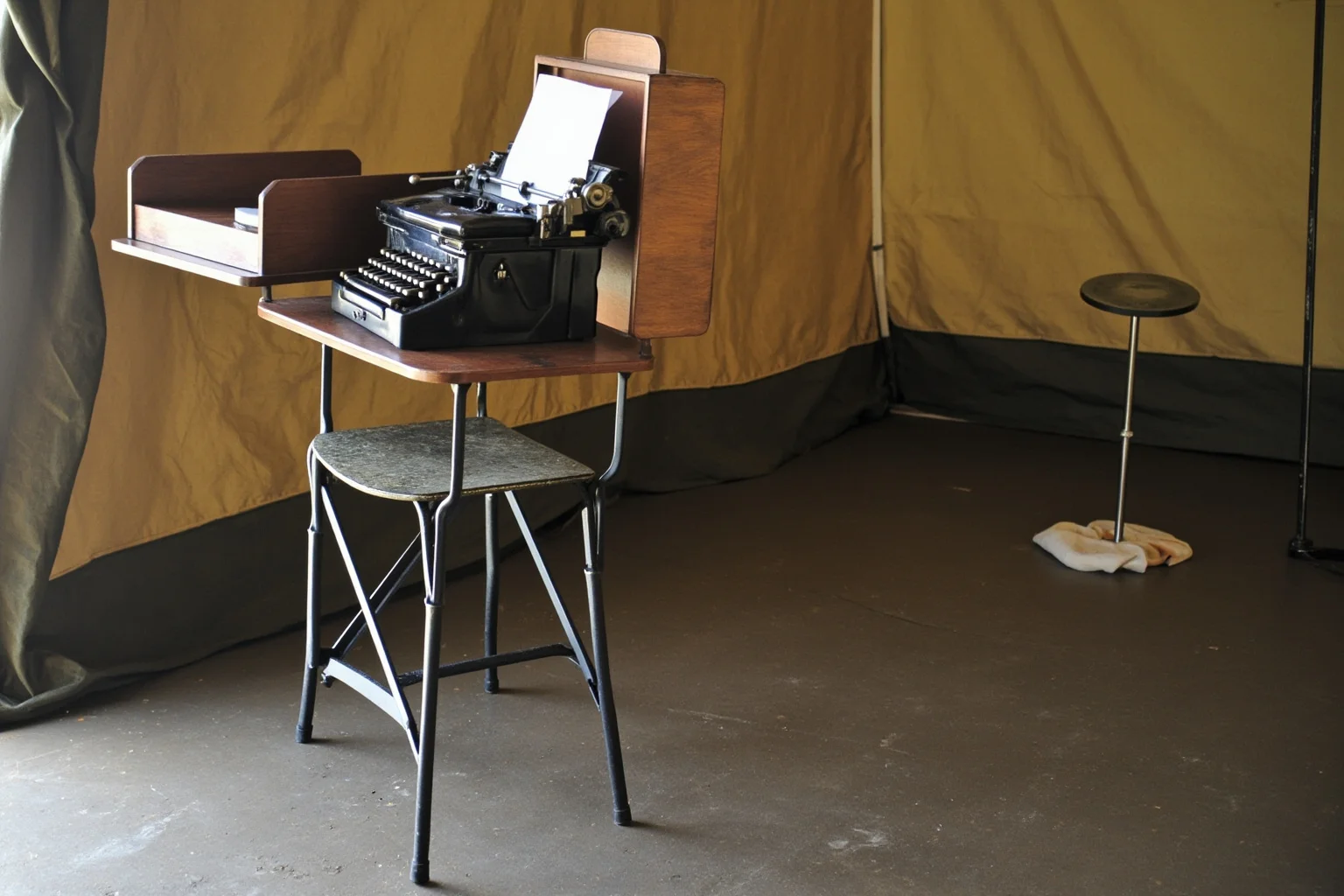 TB or Not TB: 22 Historical Figures Who Contracted Tuberculosis 14 A war correspondent's tent camp with a folding desk and typewriter, early 1900s style
