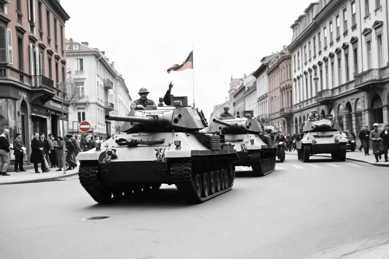 A WWII French armored division commander leading tanks into a liberated European city street