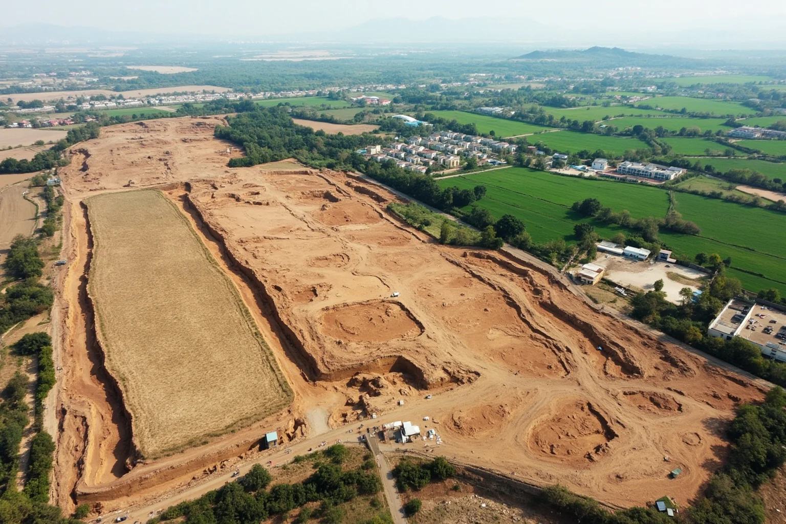 Aerial illustration of an archaeological excavation site near Xi'an, China, with pits and rural farmland nearby