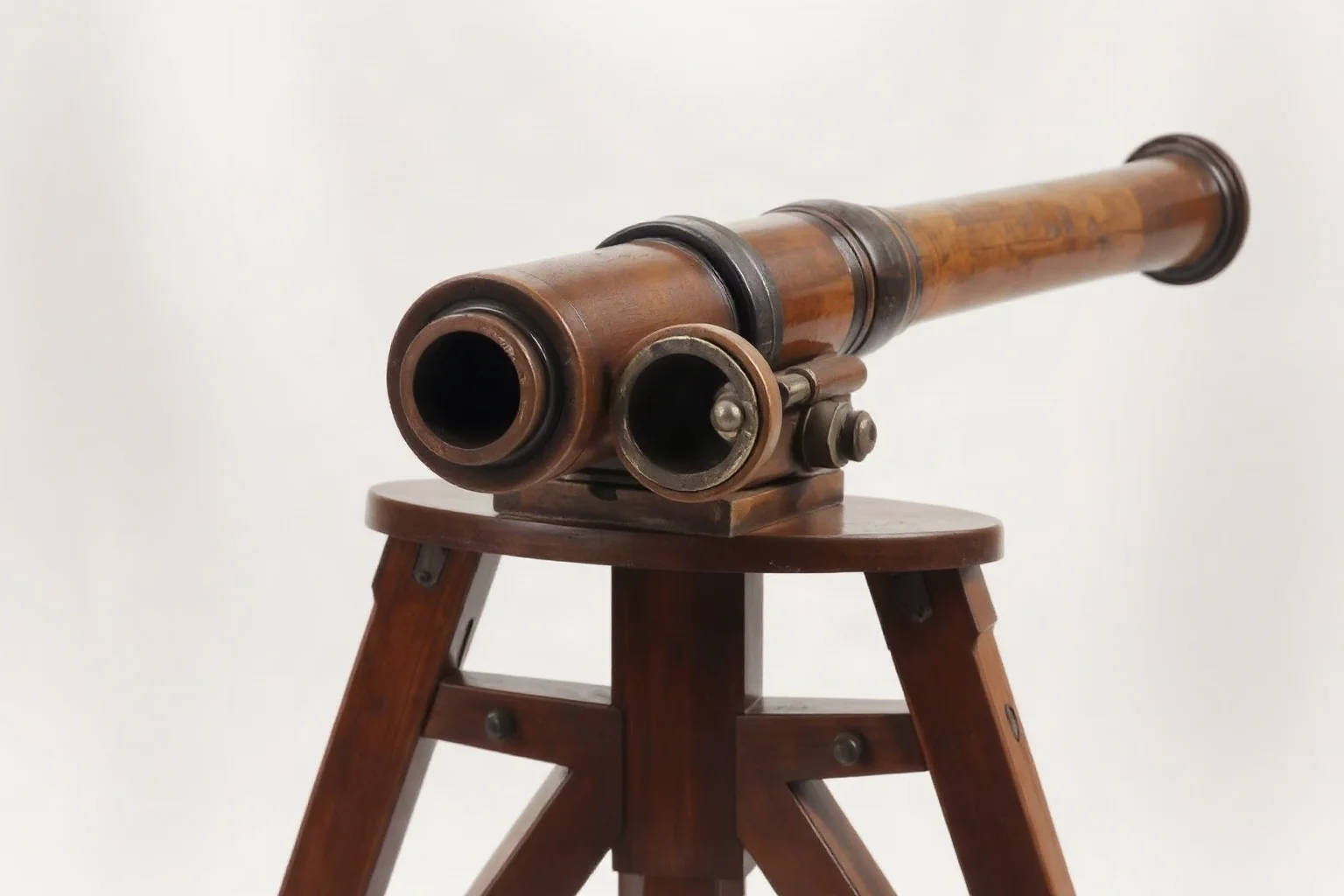 An early 18th-century Puckle Gun with rotating cylinder chambers mounted on a wooden tripod