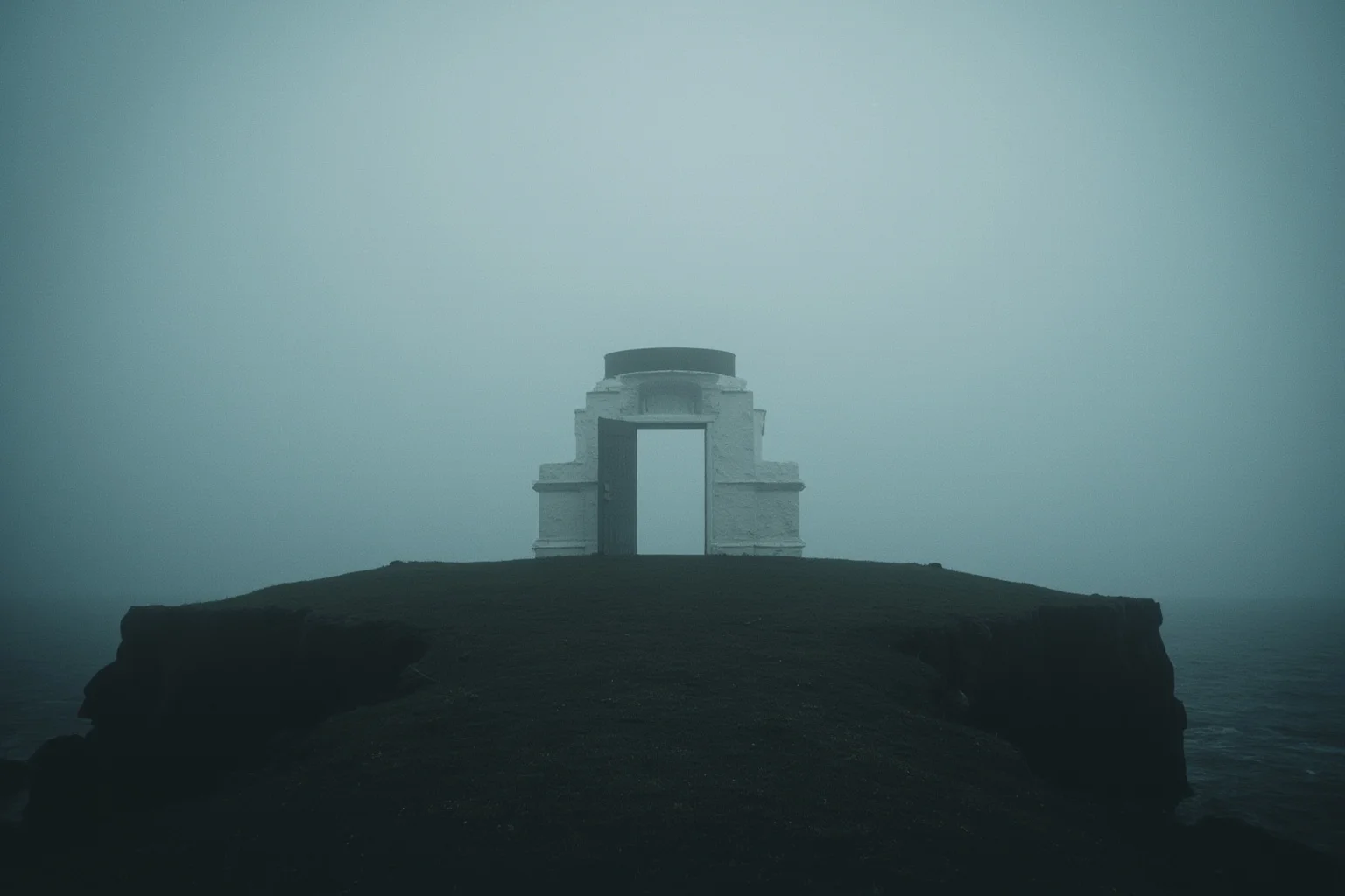 Strange History: Why Lighthouse Keepers Went Mad (Or Did They?) 11 An empty Scottish island lighthouse with a lone open door swinging in the wind, eerie overcast atmosphere