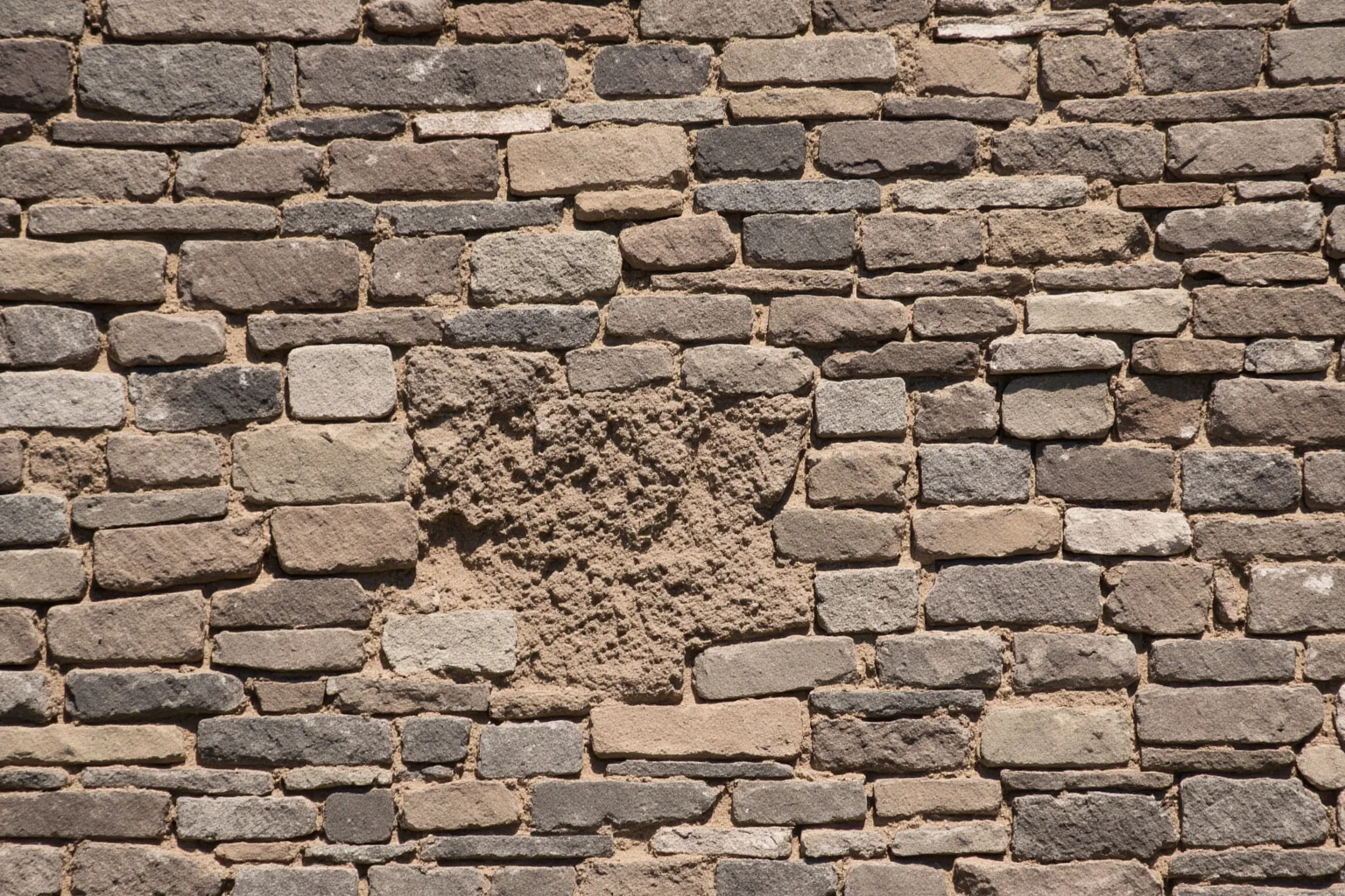 Close-up of Sacsayhuamán's tightly interlocked polygonal stone walls in Peru