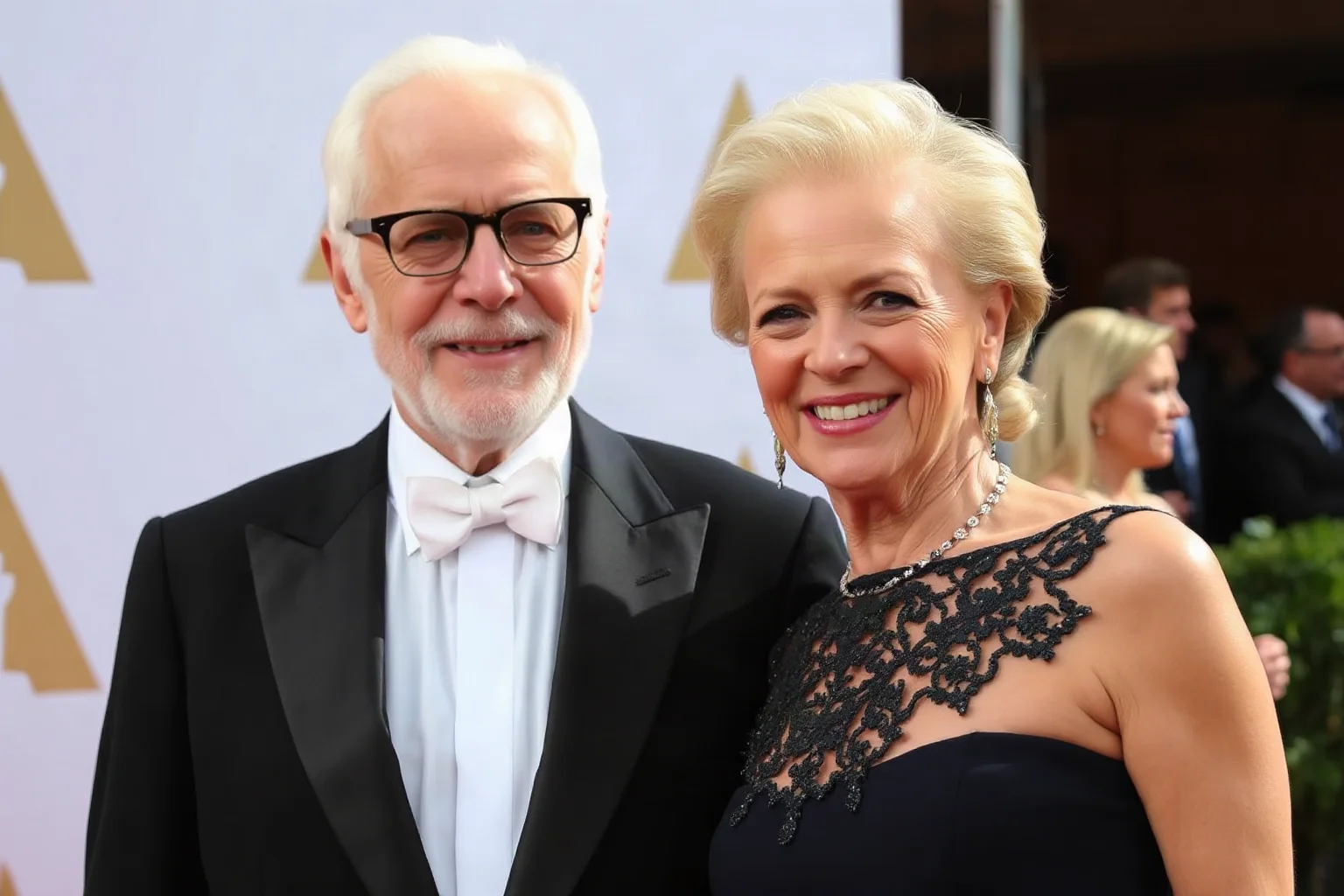 Elderly Hollywood couple smiling together at a film awards ceremony, elegant formal wear