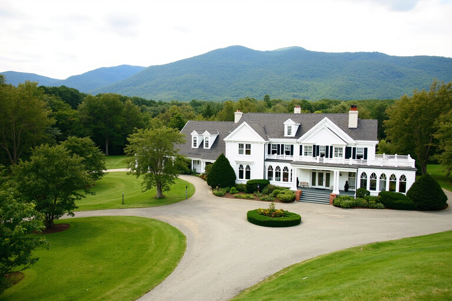 25 Famous American Historical Homes You Can Still Visit Today 22 Elegant Georgian Revival country estate in Vermont with a white facade and mountain backdrop