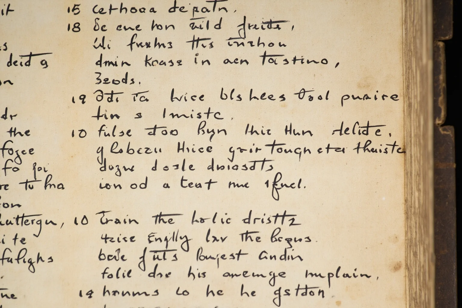 Old handwritten manuscript page showing chapter and verse markings in margin