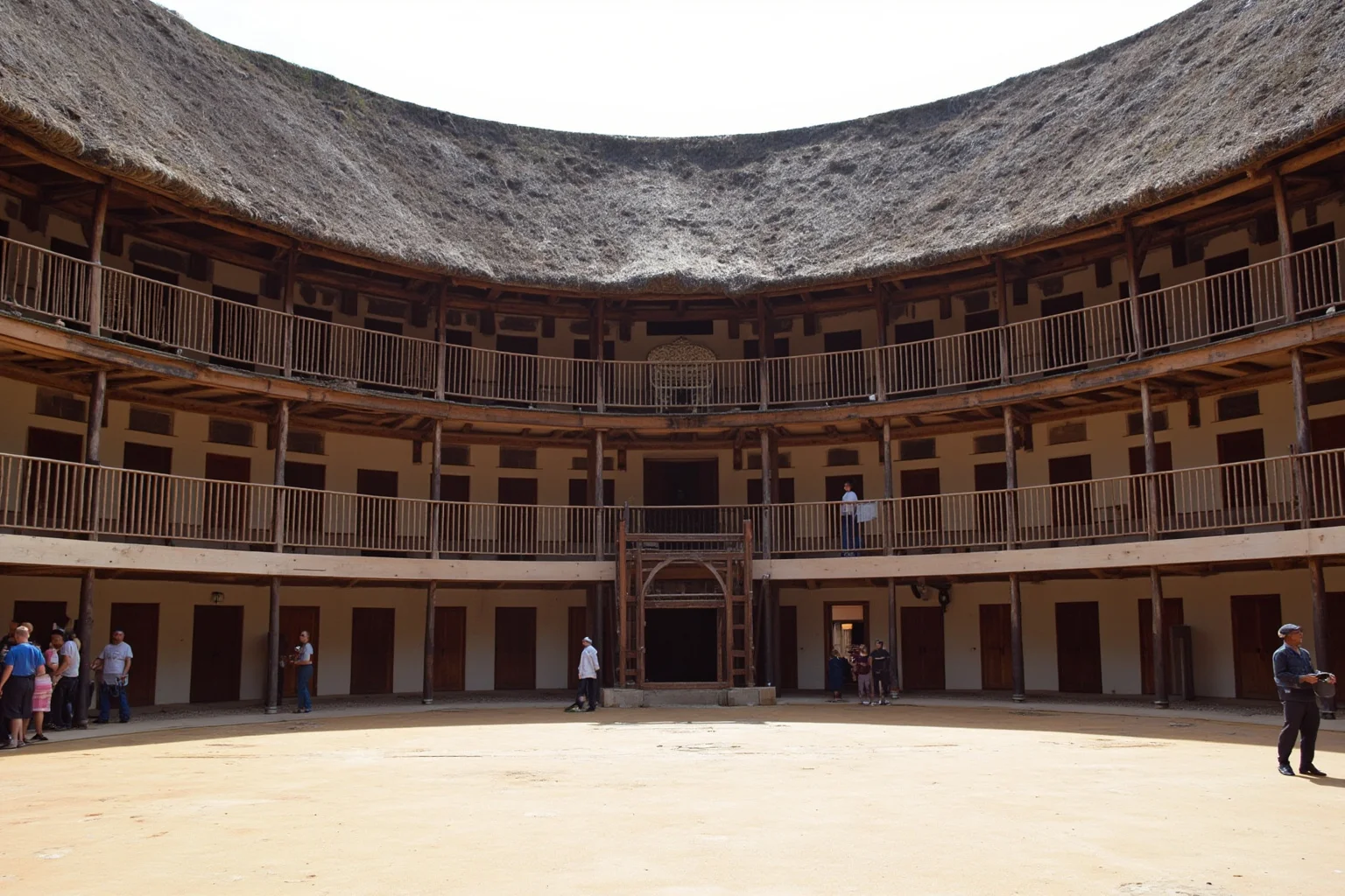 Reconstructed Elizabethan Globe Theatre in London, round wooden open-air structure with thatched roof