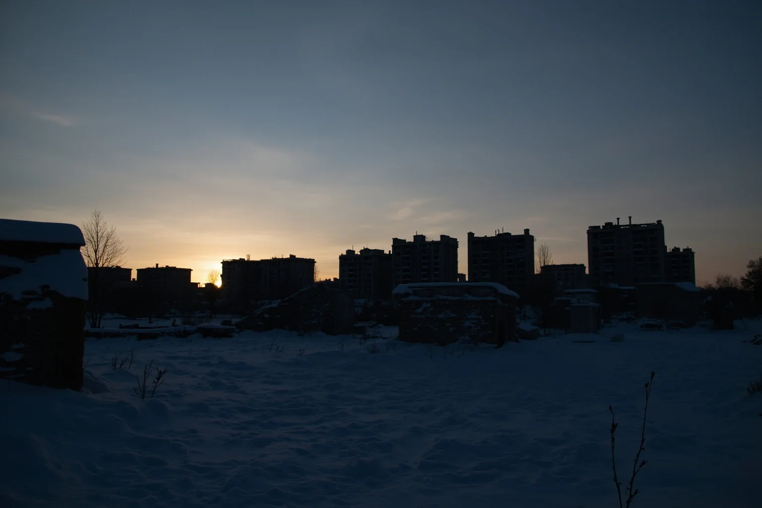 Best Nonfiction Books About WWI: The 25 Best WWI and WWII Reads 21 Snow-covered ruined cityscape silhouette at dusk, somber winter atmosphere