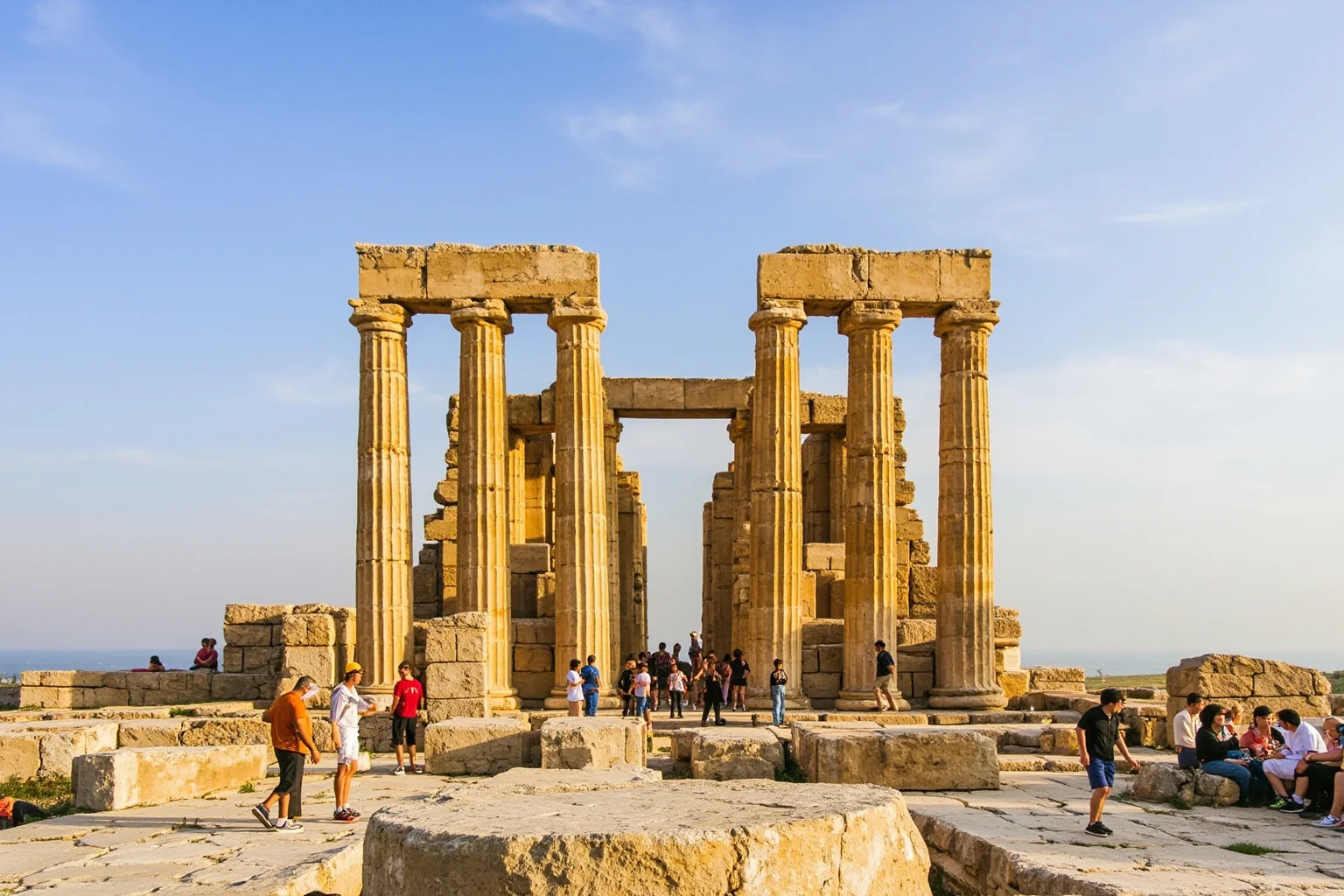 The enormous Trilithon stones at Baalbek towering over visitors for scale