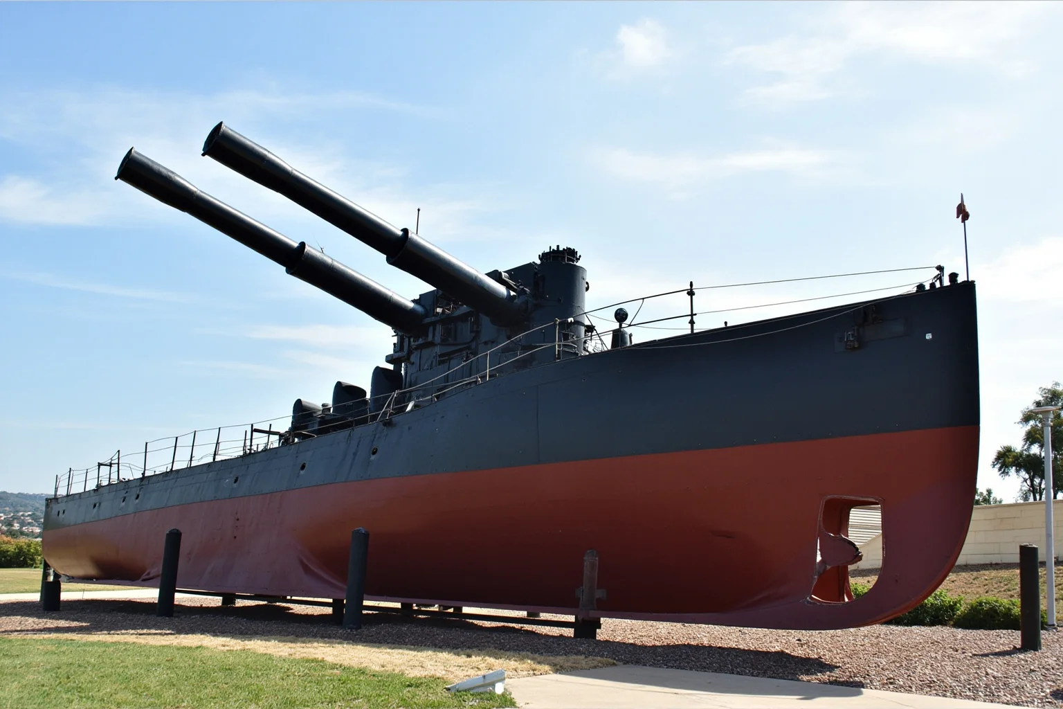 The Longest-Serving Warships of All Time 9 Turn-of-the-century steel pre-dreadnought battleship with two large gun turrets, preserved on land as a memorial