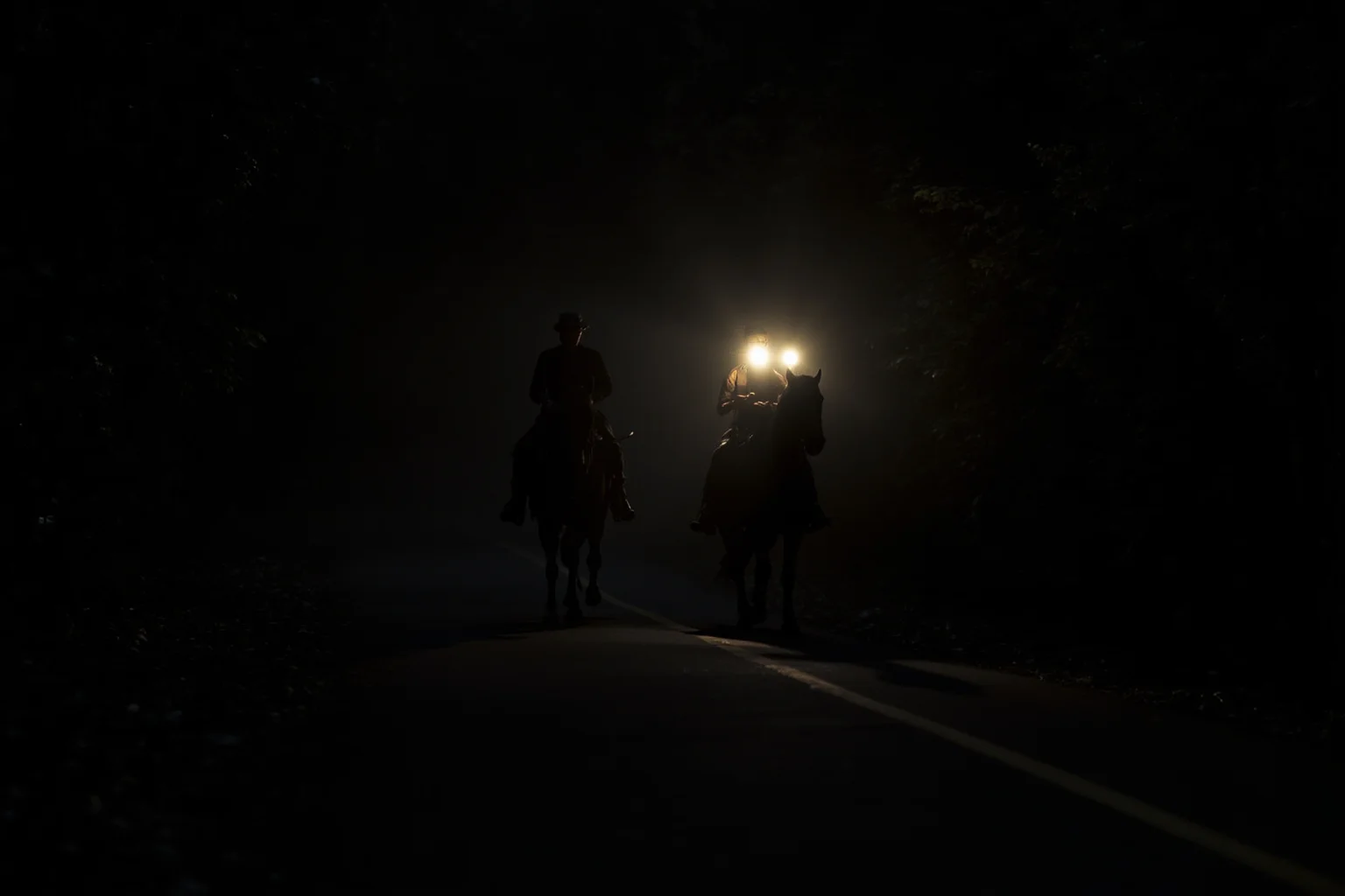 Two silhouetted riders on horseback fleeing down a dark wooded Maryland road at night, lanterns glowing faintly