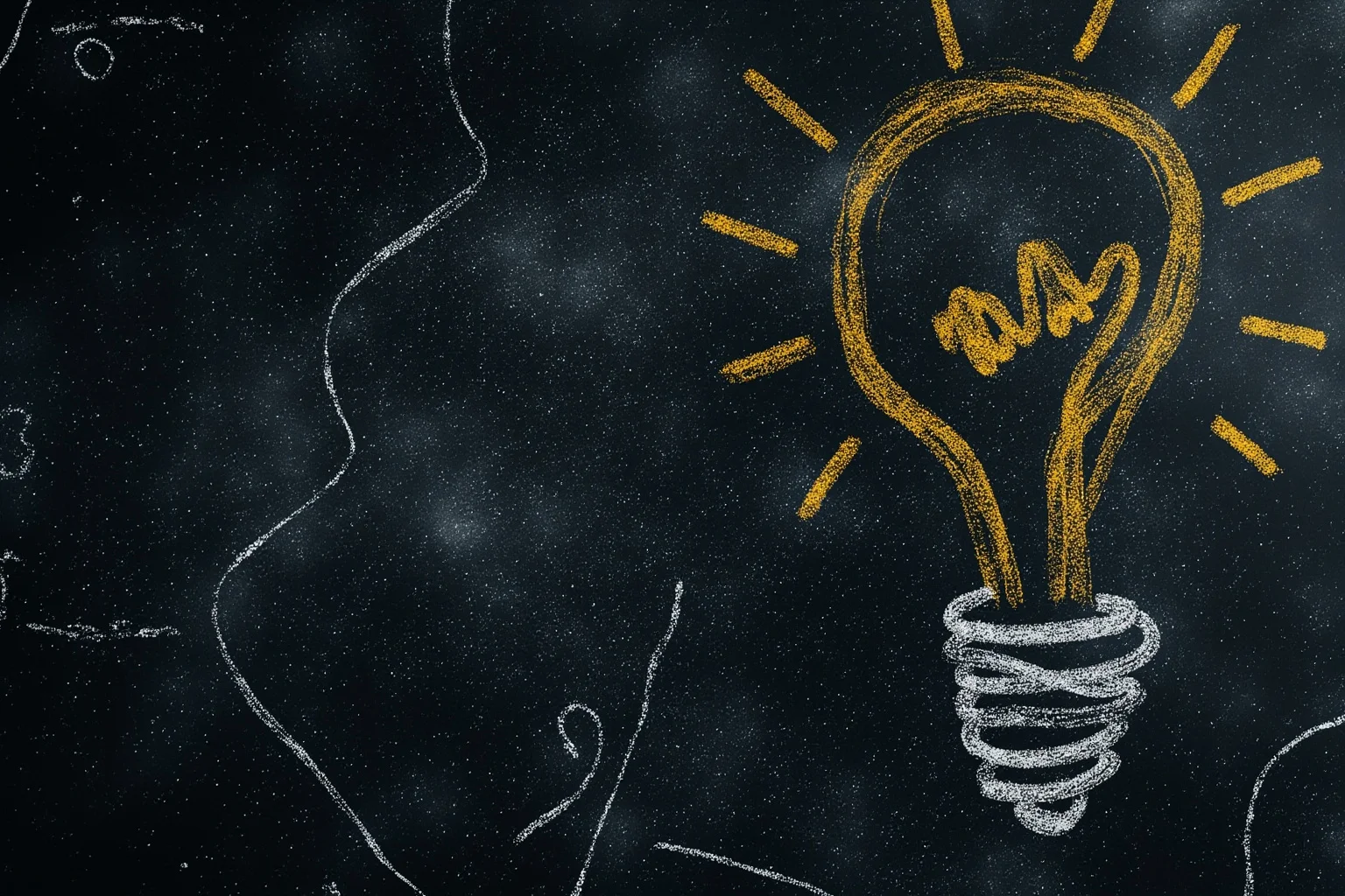 Words of Wisdom: 20 of Albert Einstein's Greatest Quotes 2 A vintage-style chalkboard covered in swirling galaxy doodles and a lightbulb icon, symbolizing imagination over knowledge