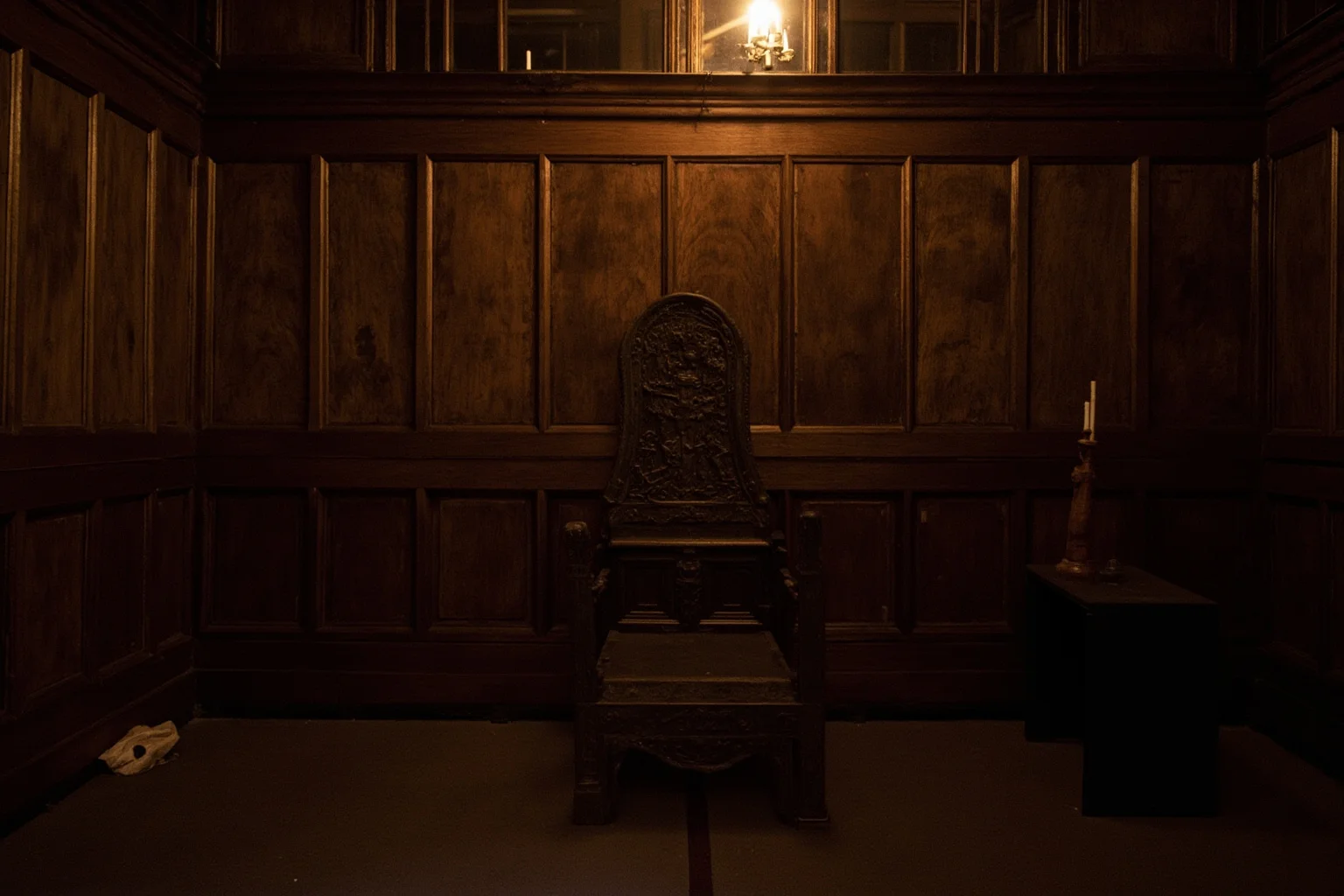 A 17th-century English court chamber with oak paneling, a throne, and candlelight, no people visible.