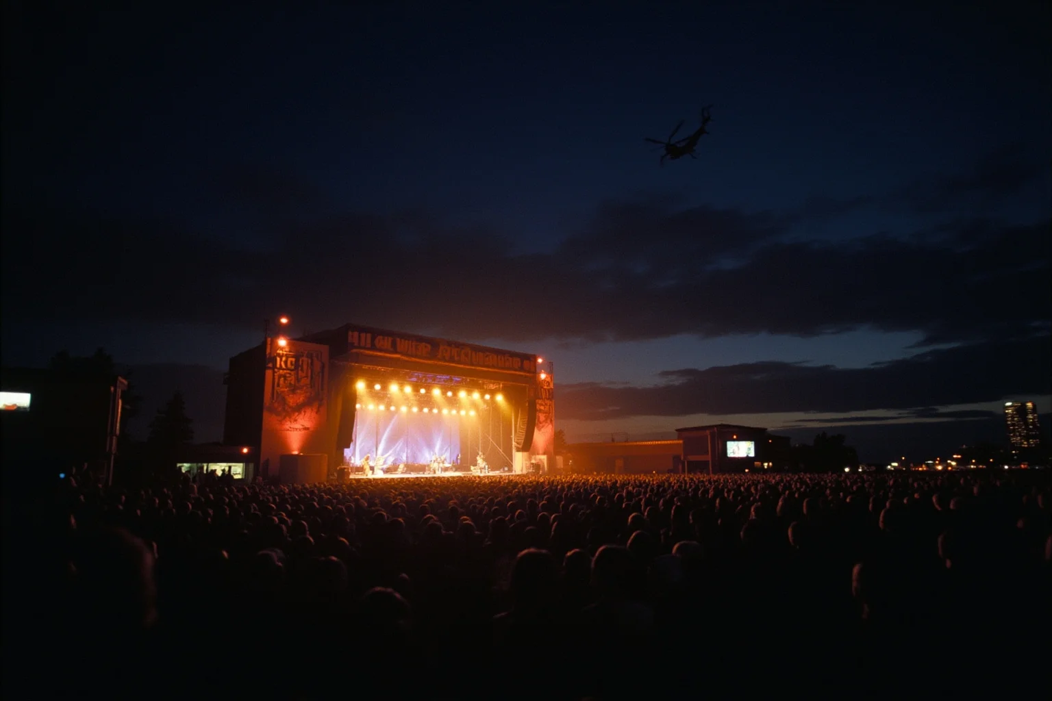 A 1990s rock concert venue with stage lights and a helicopter silhouette in the night sky, San Francisco Bay Area backdrop, moody tones