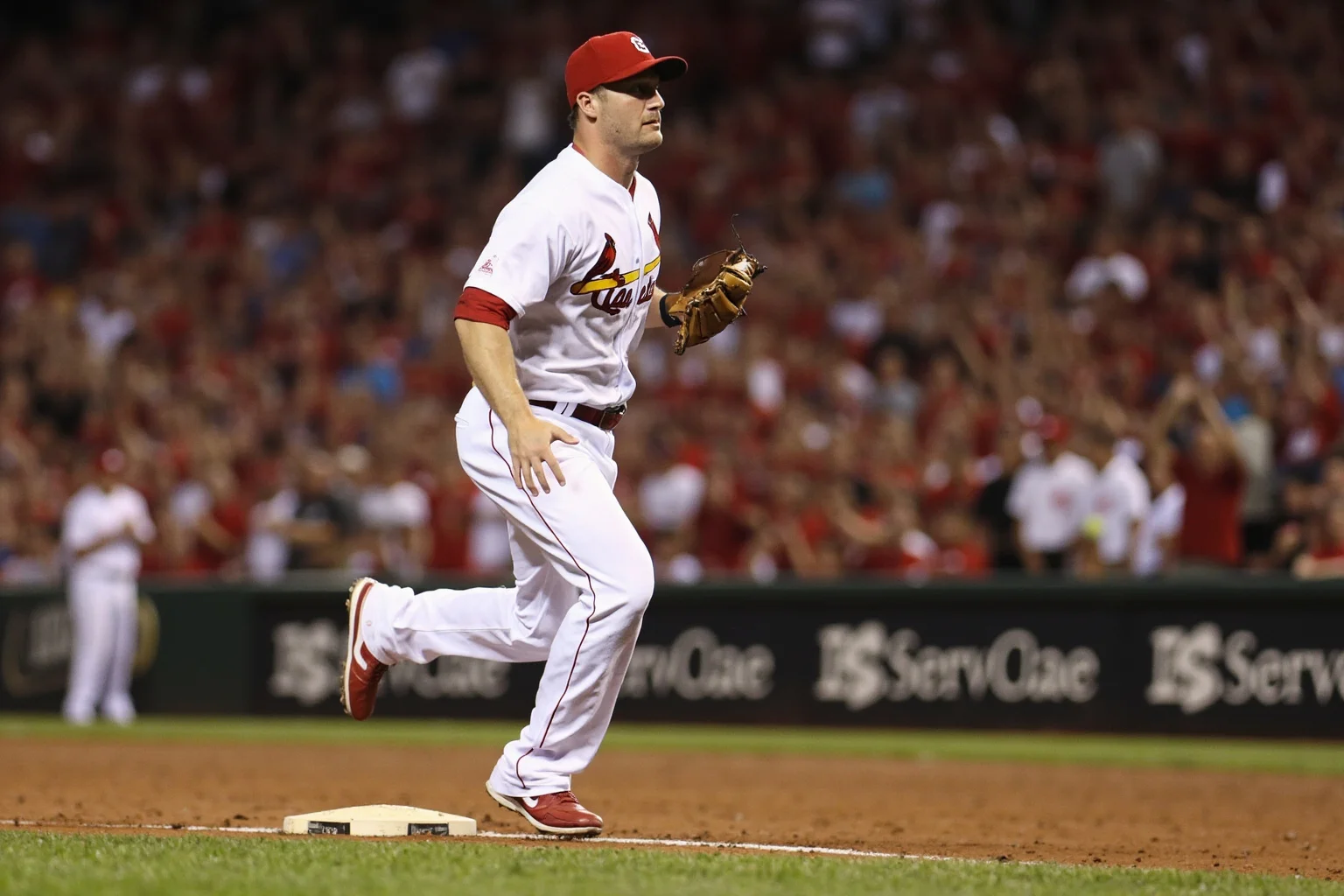25 Memorable Moments That Defined World Series History 22 A 2011 Cardinals-style walk-off home run in extra innings, Busch Stadium-style crowd, hometown hero rounding bases, no recognizable face.