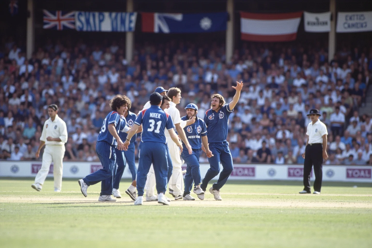 The Greatest Underdog Stories in History: 20 Unlikely Wins That Still Inspire 21 A cricket match at a British stadium from the 1980s with players in blue jerseys celebrating, vintage sports photography style, no recognizable faces.