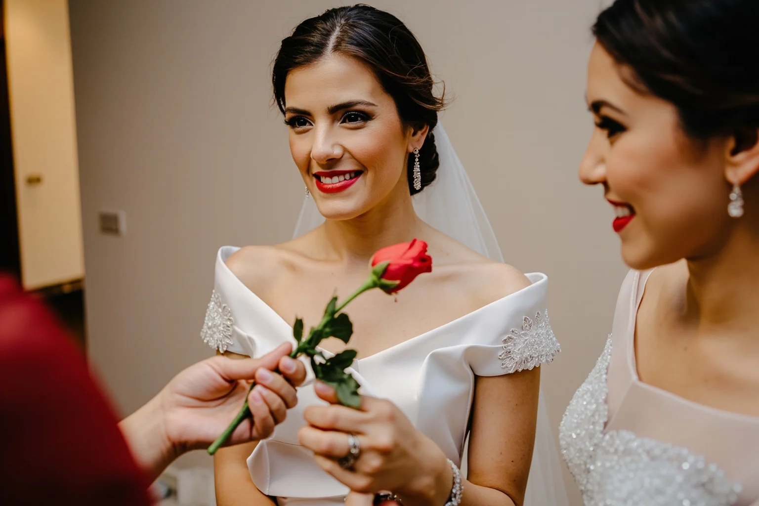 A Filipino debutante in an elegant gown receiving a rose from a family member during an 18 roses debut celebration