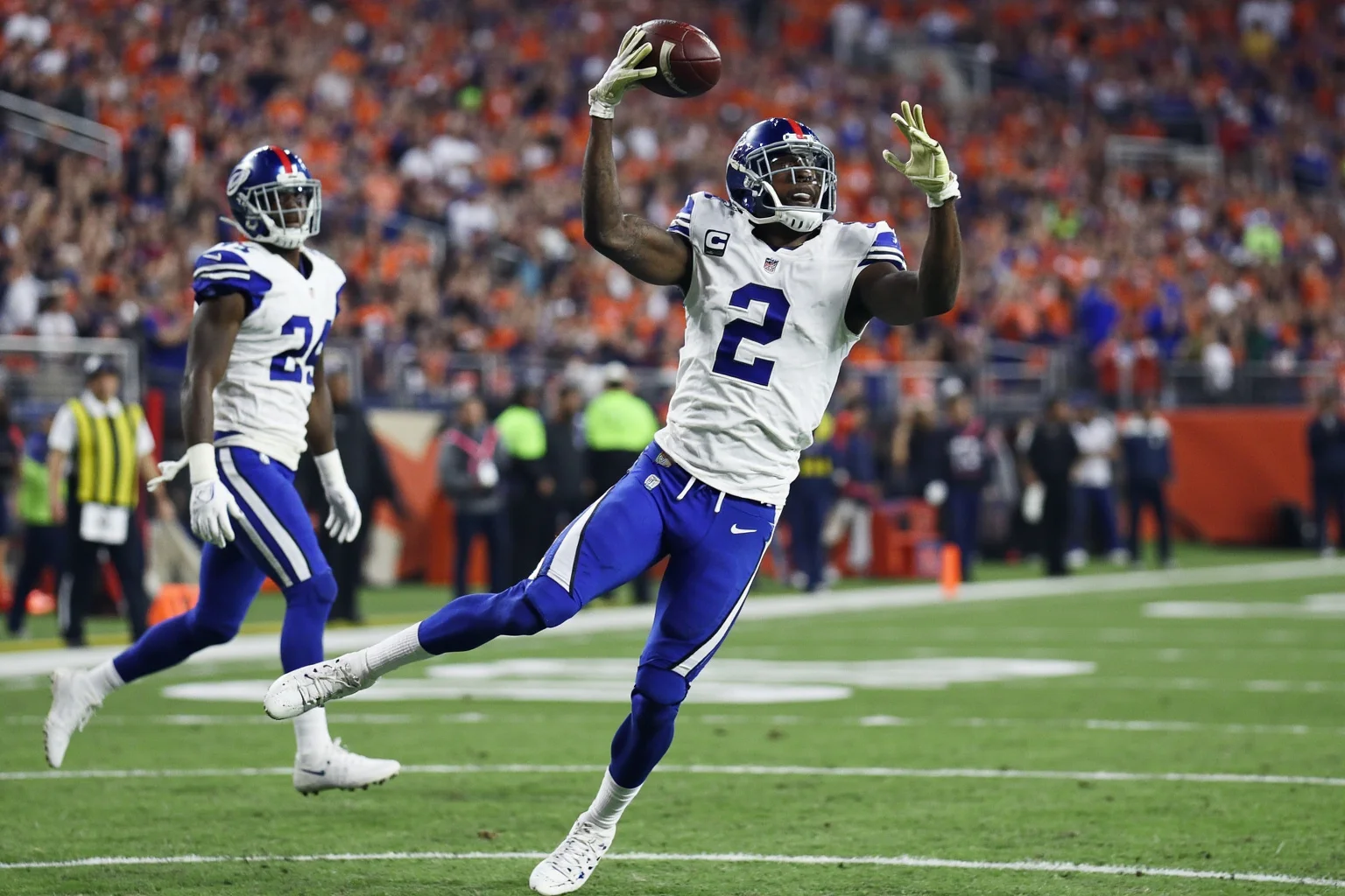A game-winning touchdown catch on a slant route in the end zone, generic uniforms, no real logos or names, final seconds.