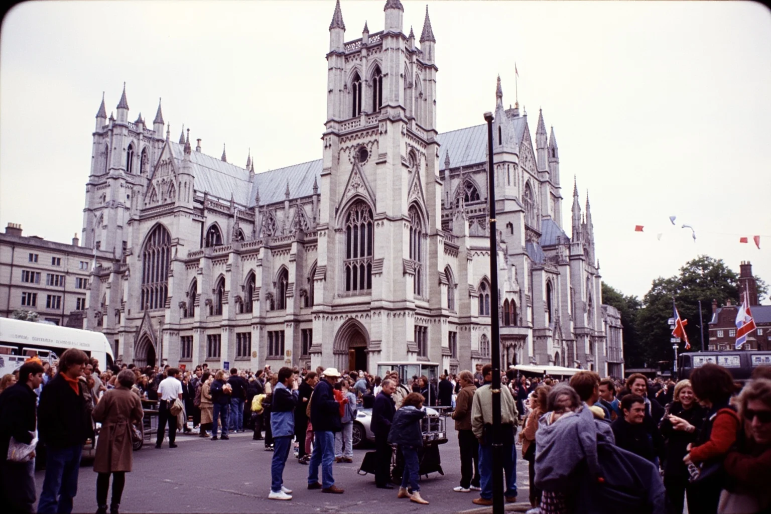 Things To Learn About The Beloved Princess Diana 6 A grand London cathedral exterior with crowds of onlookers and bunting, 1980s atmosphere, wide shot, no recognizable individuals.