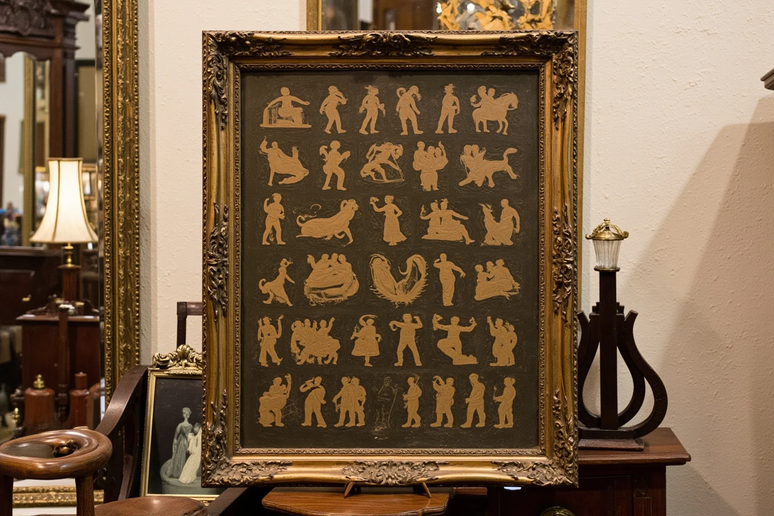 A large 19th-century family portrait frame with many small silhouettes, antique furniture surrounding it, no people.