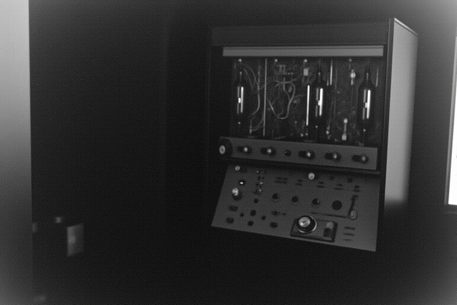 A large room-sized electronic computer with vacuum tubes and cables, 1940s style, black and white photo look