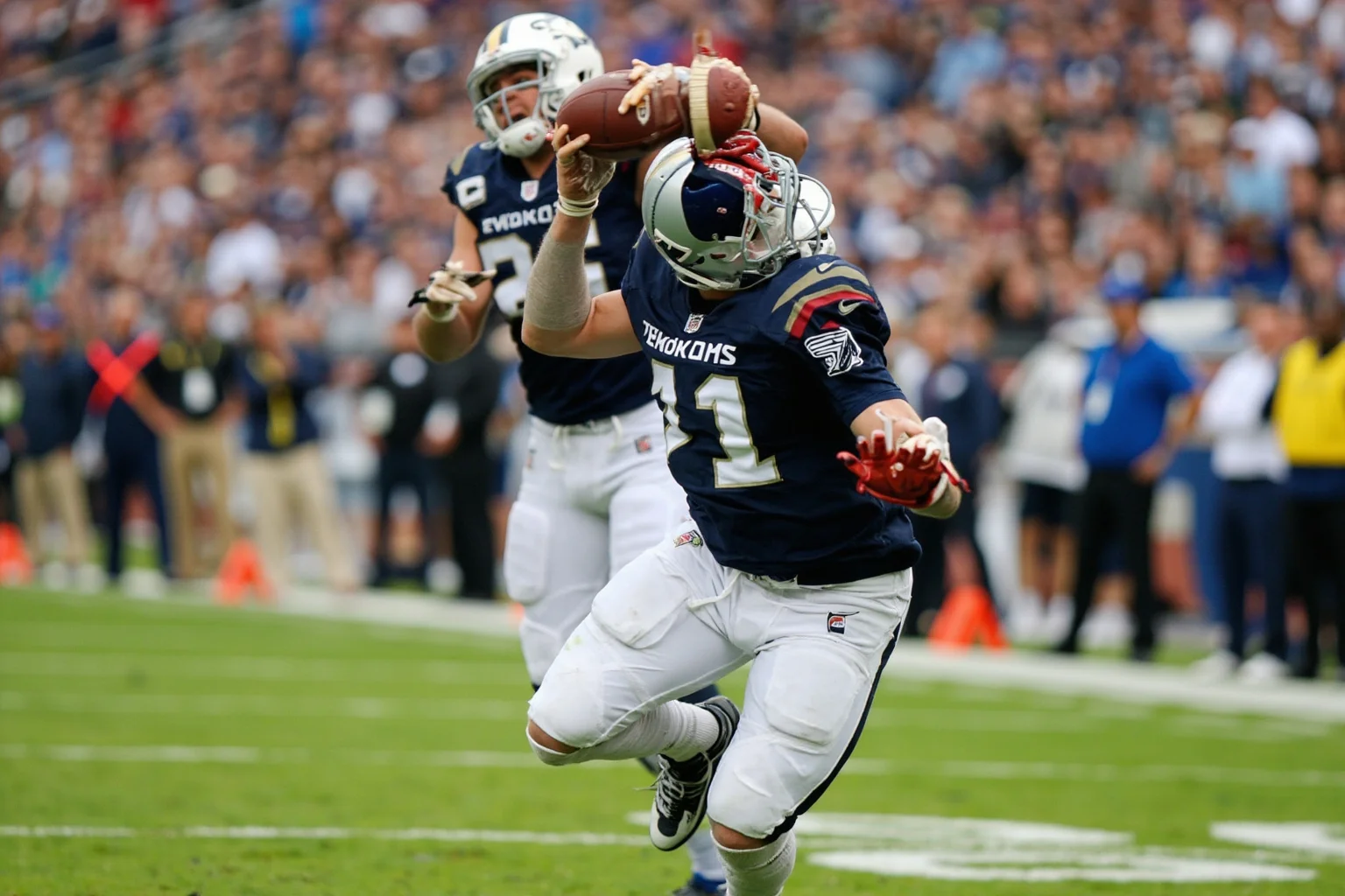 A long punt return setting up a go-ahead score, generic uniforms, no real logos or names, fourth-quarter momentum.