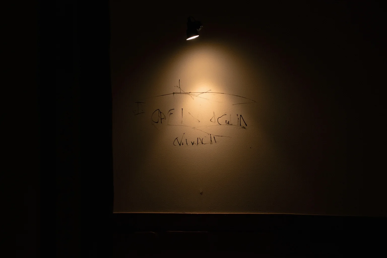 23 Ancient Graffiti Messages That Sound Shockingly Modern 6 A single short Latin graffito scratched on an inn wall, dim lamplight, quiet lonely mood, no people.