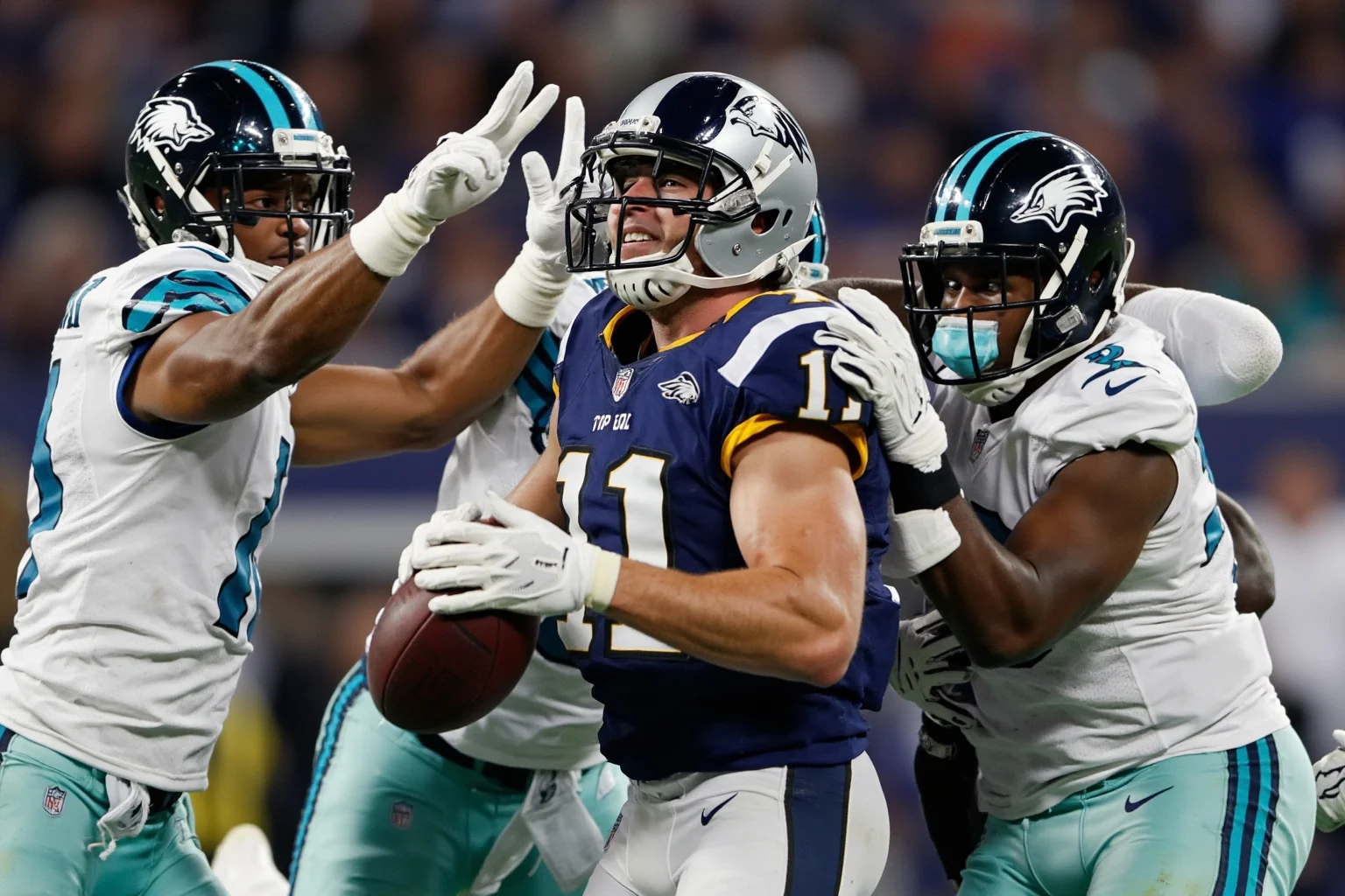 An undrafted rookie cornerback celebrating an interception with teammates, generic uniforms, no real logos or names, joyful pile.
