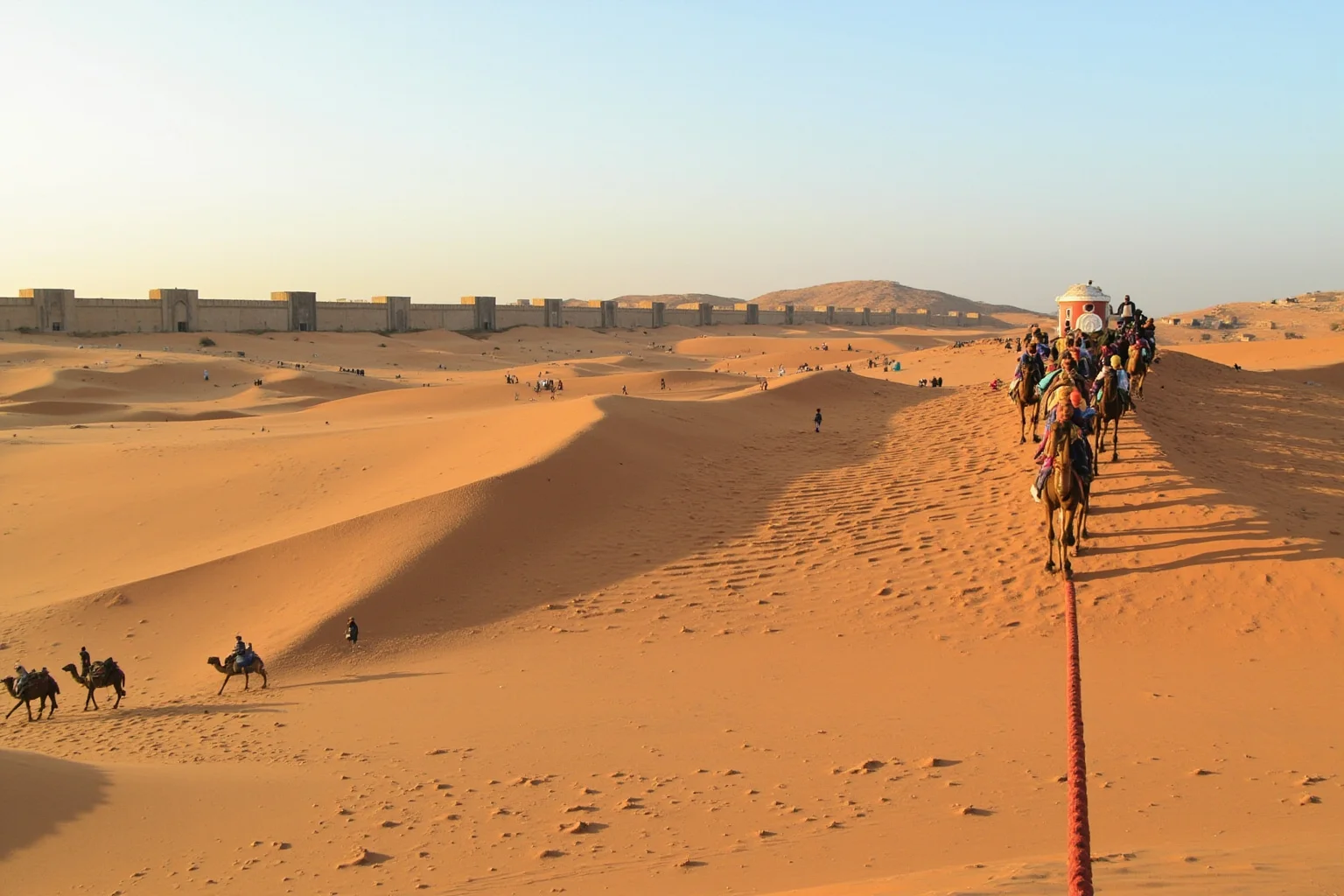 The Fertile Crescent: 20 Ancient Civilizations That Started Society As We Know It 15 Aramean caravan crossing the Syrian desert with camels and goods, Damascus city walls ahead.