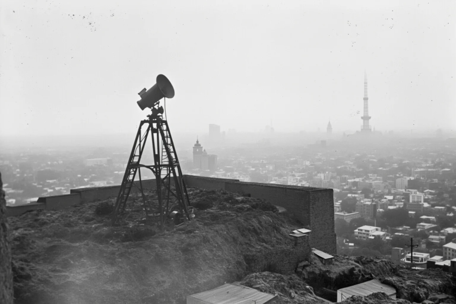 Things Americans Did First Before Any Other Country 14 Early television camera and transmitter tower from the late 1920s set against a small American city skyline.