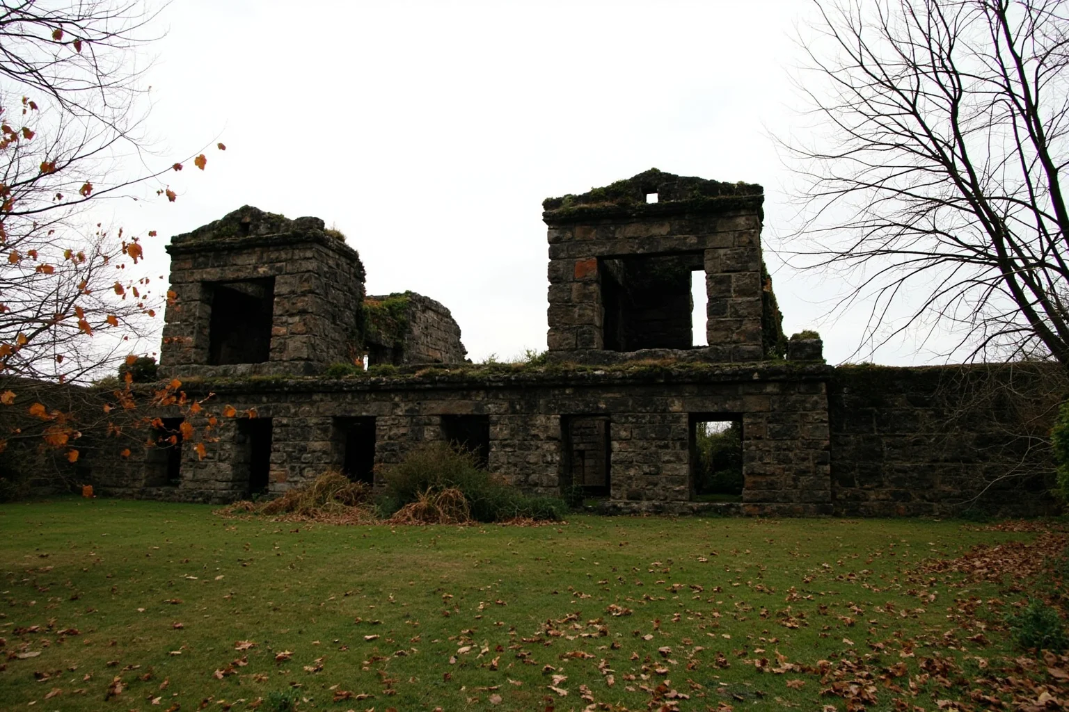Massive hand-cut stone Kirkbride asylum with twin towers, overgrown lawn, autumn leaves, grey sky, no people, photorealistic exterior.