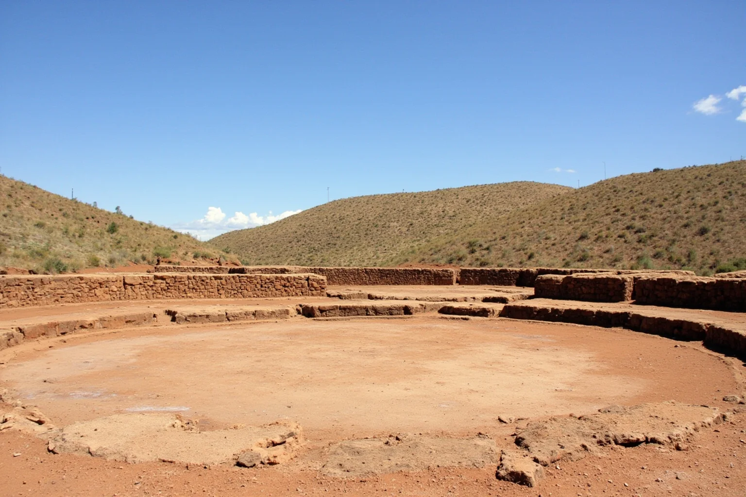 22 Oldest Monuments Found Around the World 9 Prehistoric adobe platform and circular plaza at Sechin Bajo archaeological site in Peru, surrounded by arid landscape