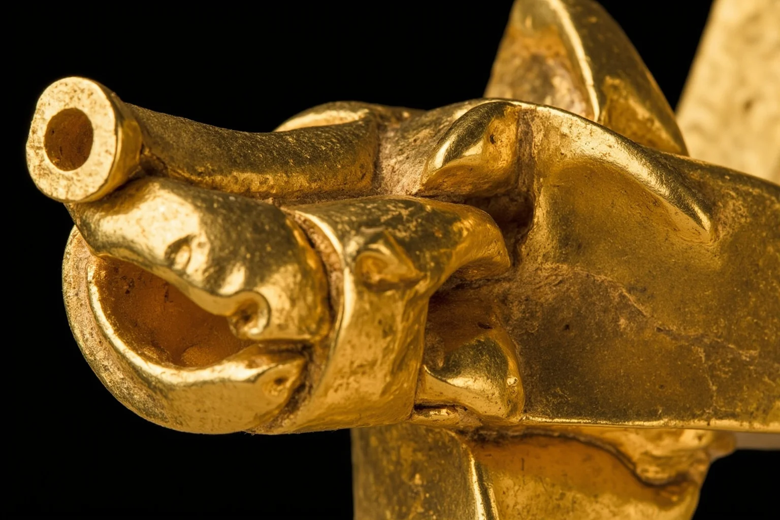Quimbaya gold artifacts resembling modern airplanes, Colombia, pre-Columbian goldwork, close-up, photorealistic